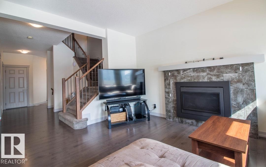 13855 143 Avenue Nw, Edmonton, AB - Indoor Photo Showing Living Room With Fireplace