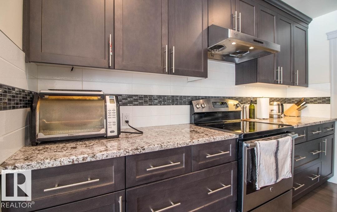 13855 143 Avenue Nw, Edmonton, AB - Indoor Photo Showing Kitchen With Upgraded Kitchen