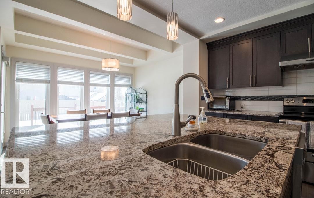 13855 143 Avenue Nw, Edmonton, AB - Indoor Photo Showing Kitchen With Double Sink