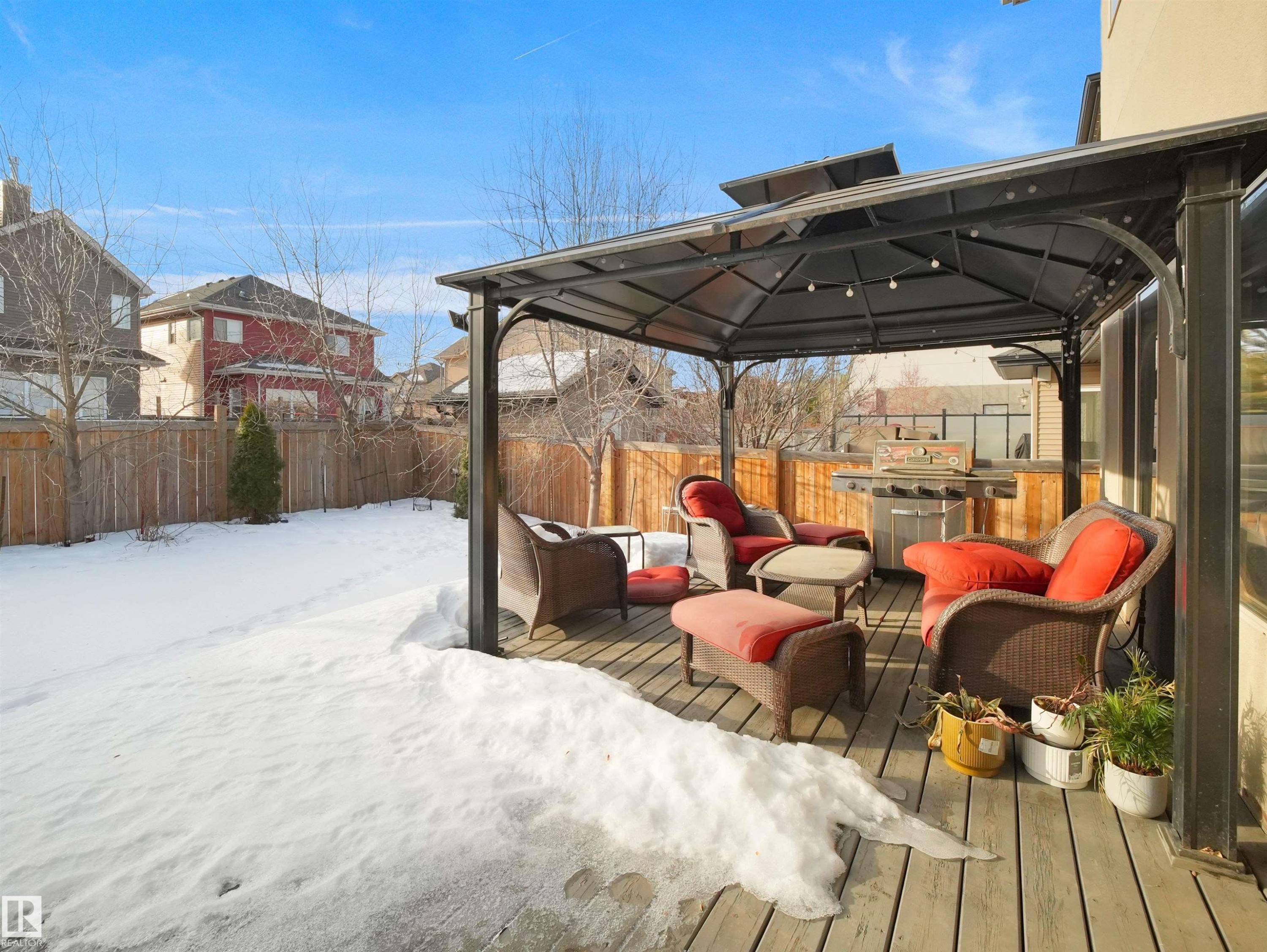 Outdoor decking area featuring a covered gazebo - 2019 Cameron Ravine Way Nw, Edmonton, AB
