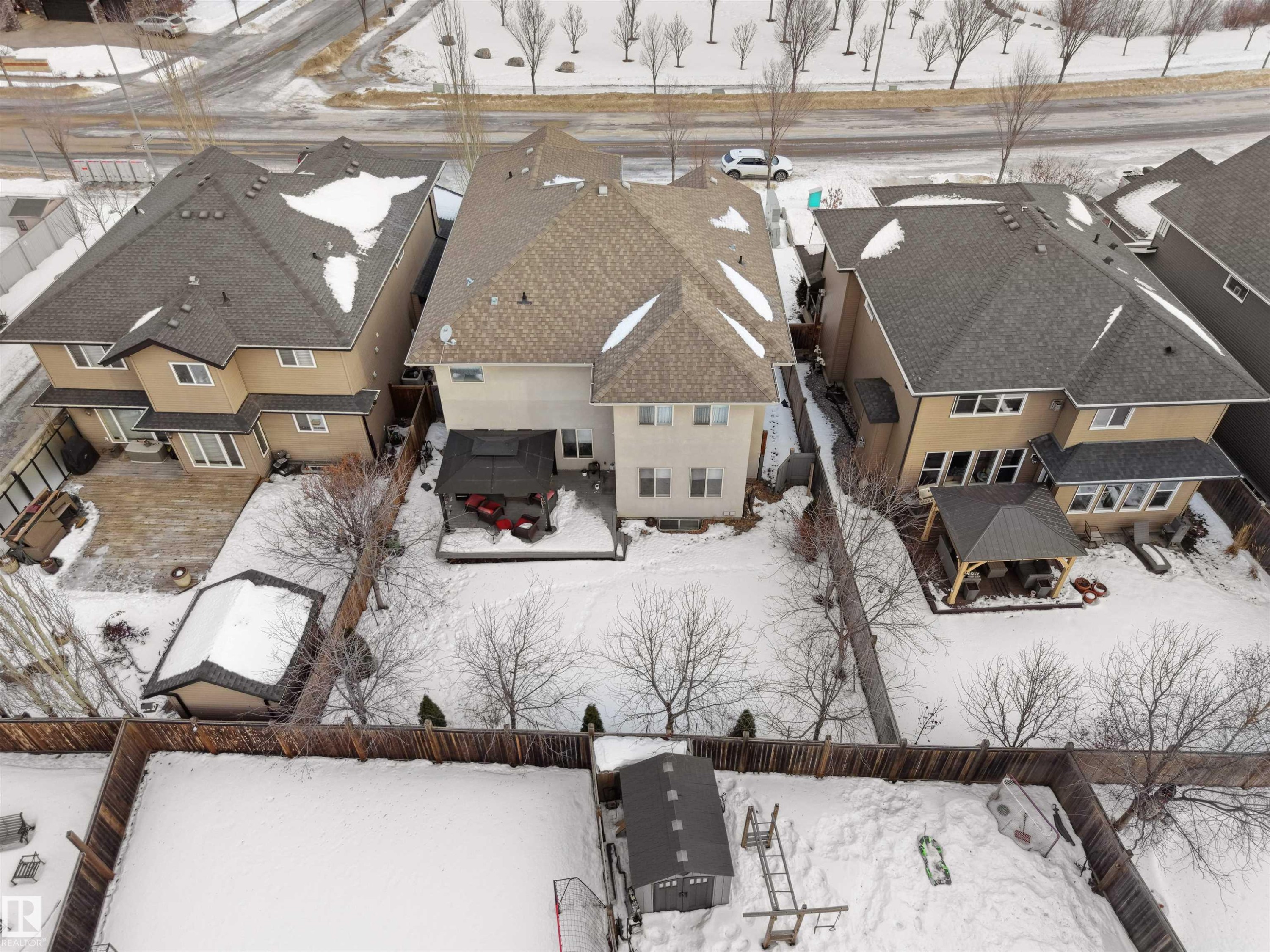 Rear exterior featuring a covered deck structure - 2019 Cameron Ravine Way Nw, Edmonton, AB