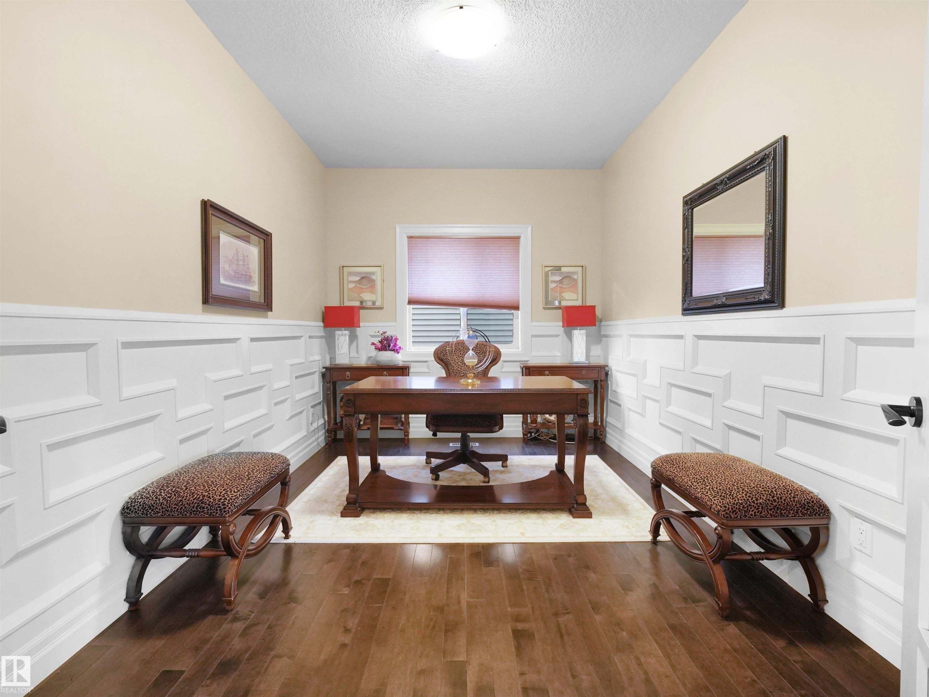 Wood-finish flooring throughout with wainscoting - 2019 Cameron Ravine Way Nw, Edmonton, AB