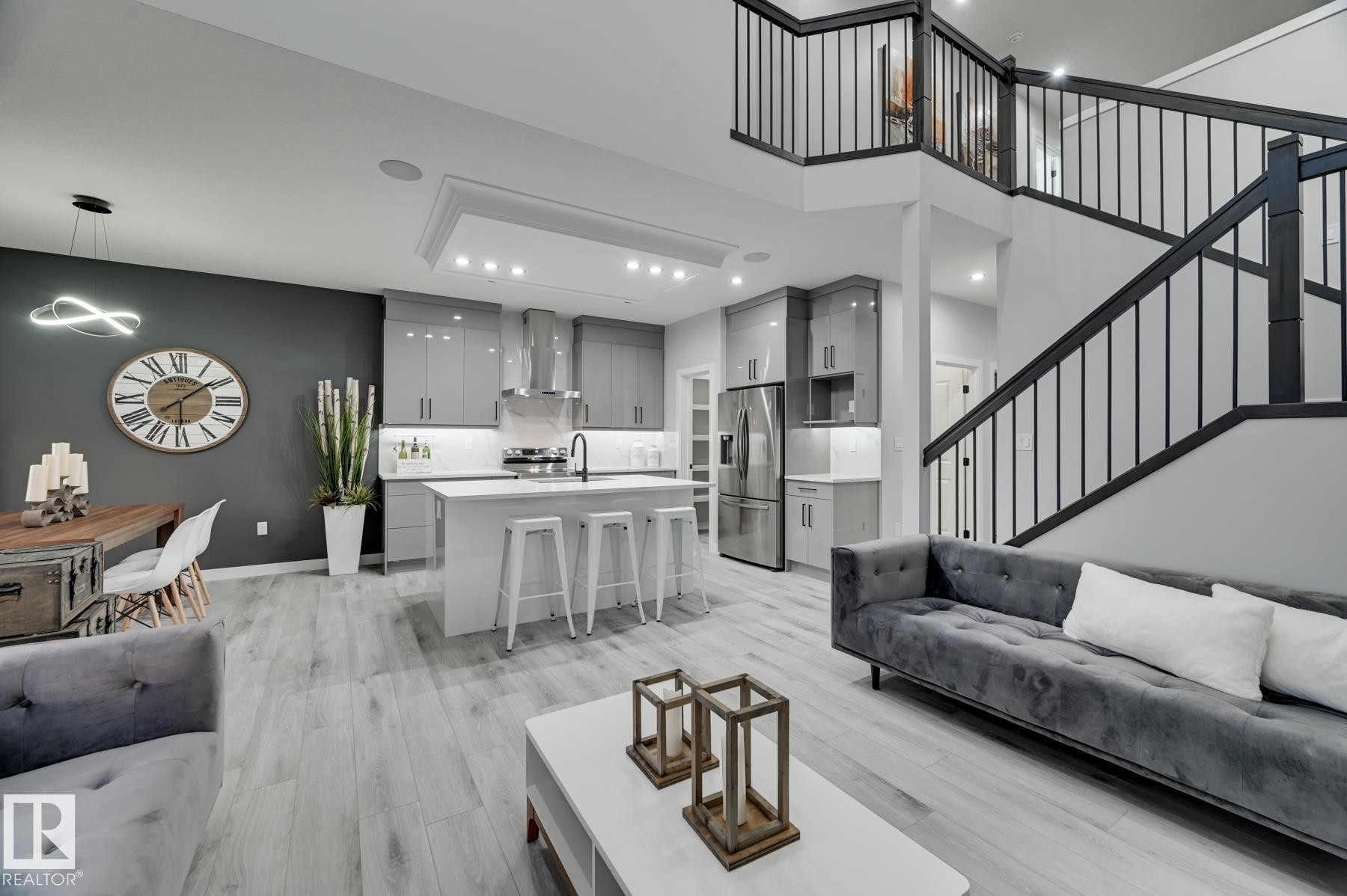 Contemporary open-concept living space featuring light wood-finish flooring - 54 Chartres Close, St. Albert, AB - Indoor