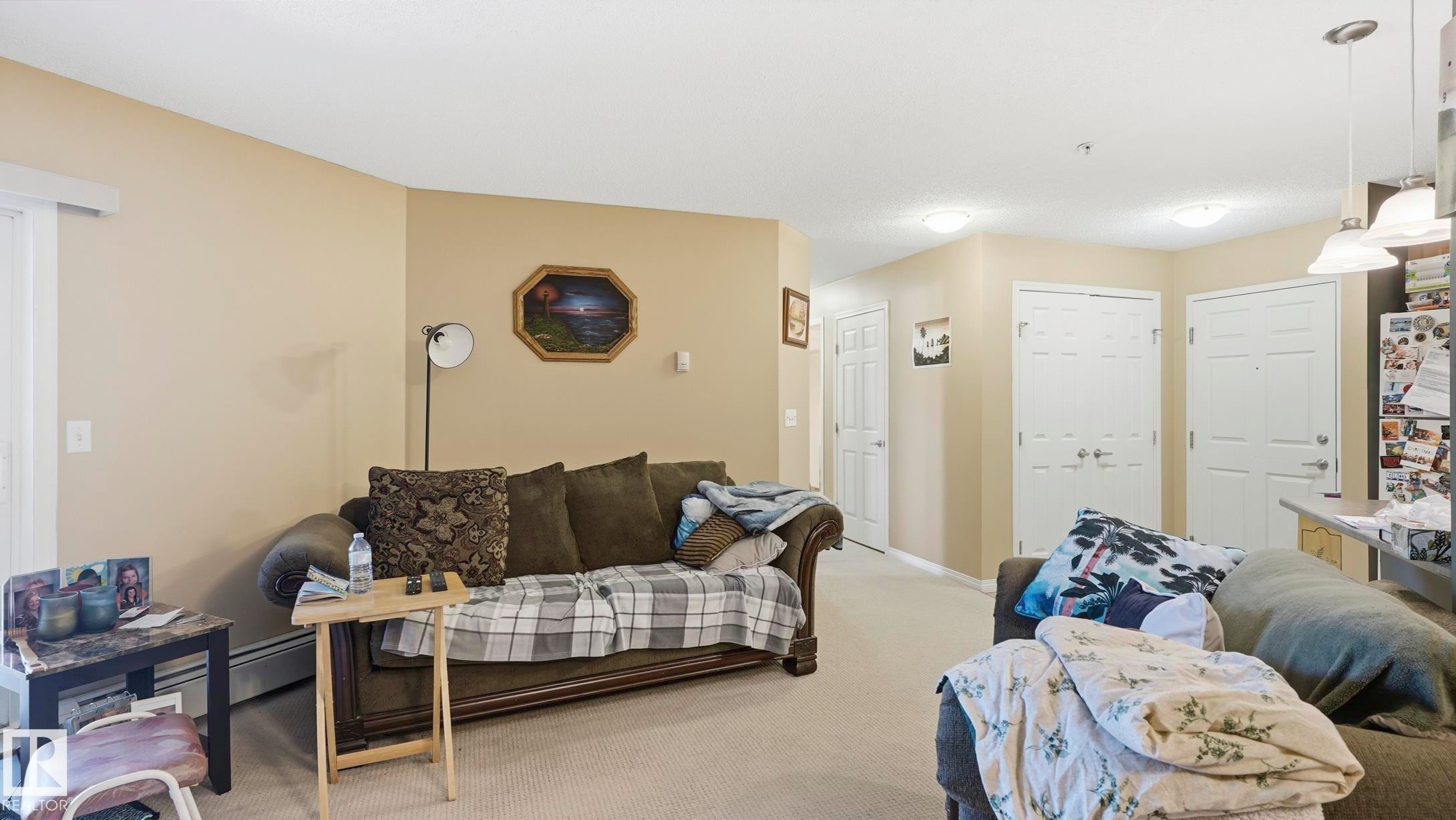 #103 630 Mcallister Lo Sw, Edmonton, AB - Indoor Photo Showing Living Room