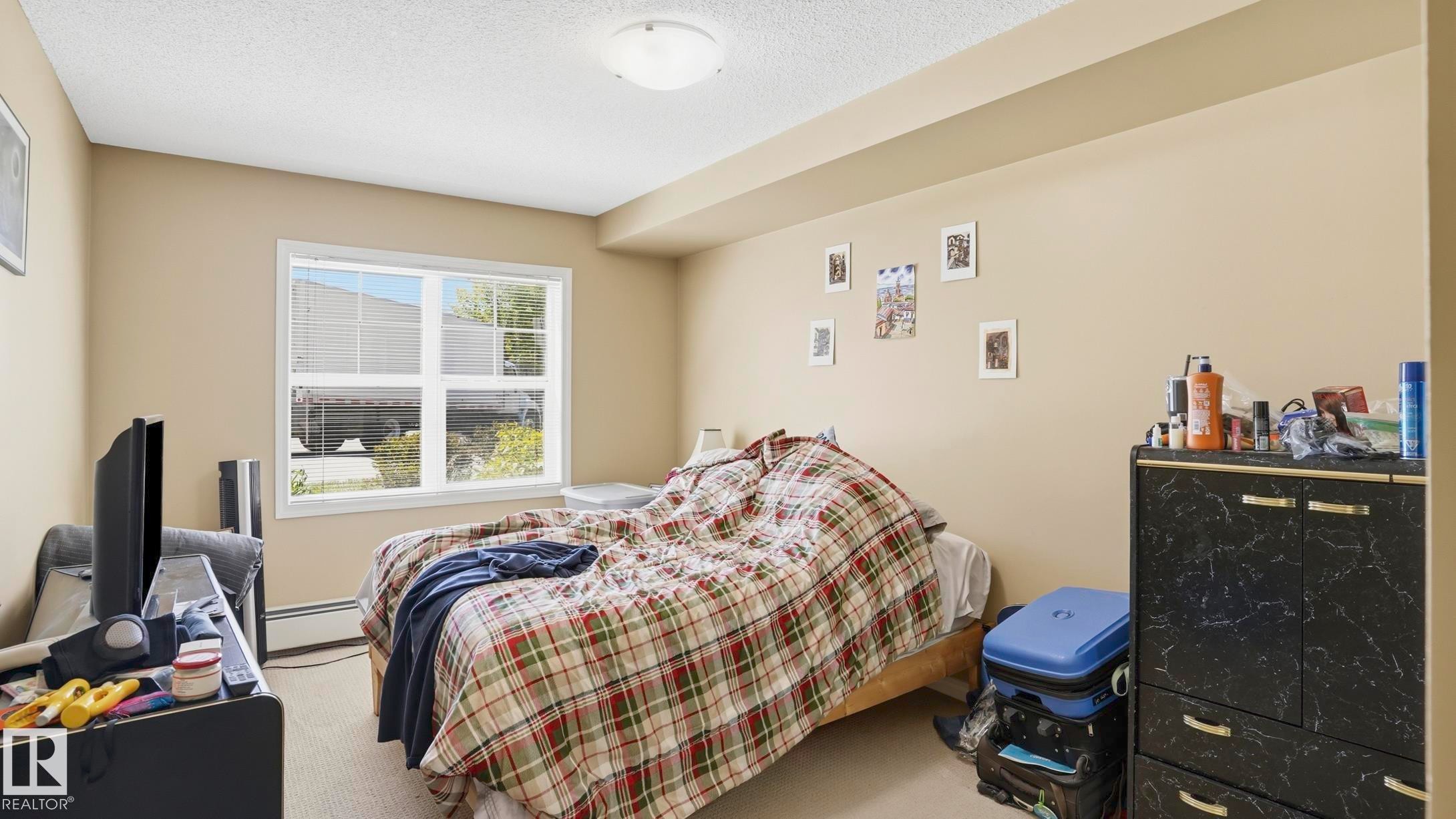 #103 630 Mcallister Lo Sw, Edmonton, AB - Indoor Photo Showing Bedroom