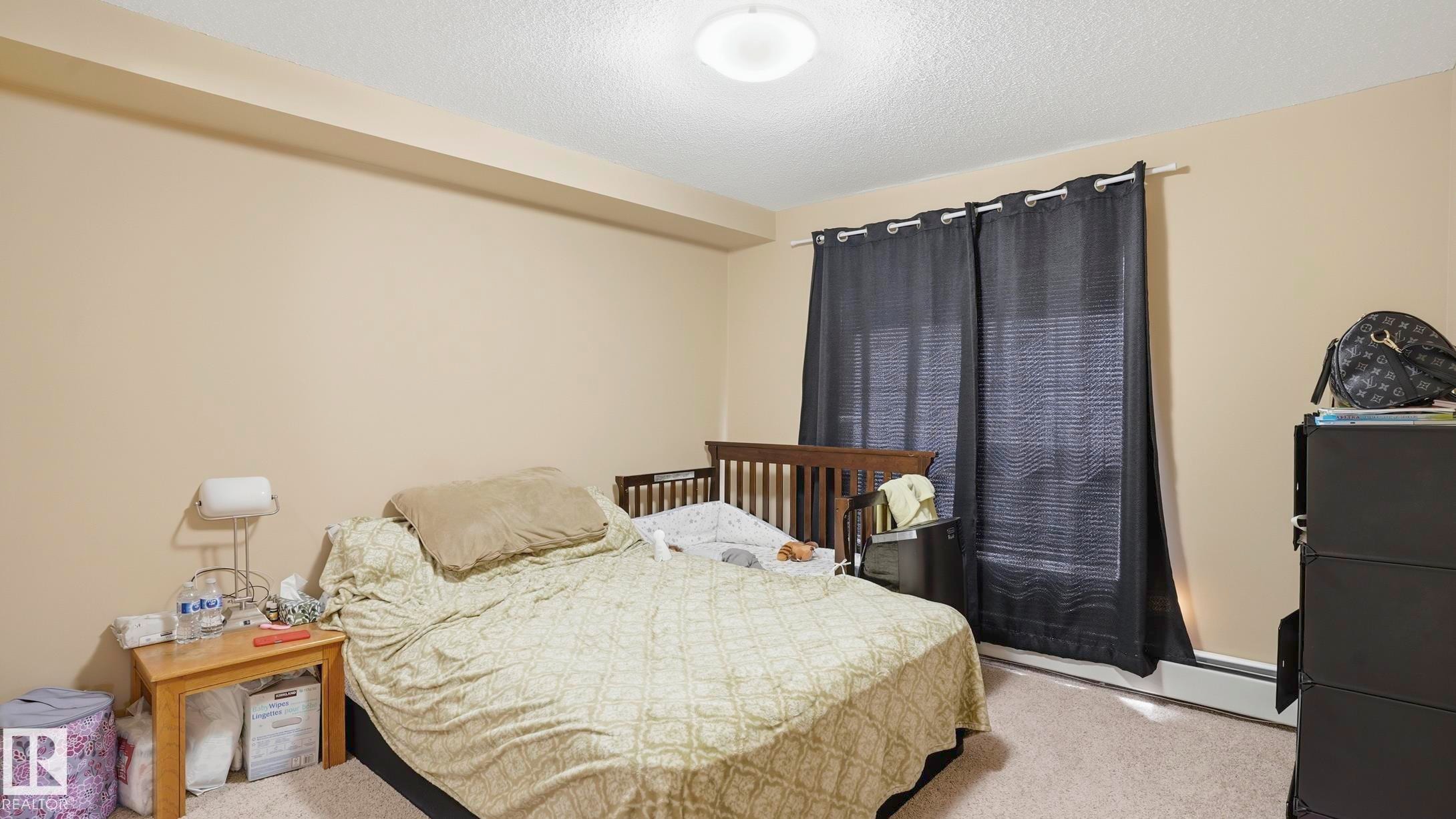 #317 630 Mcallister Lo Sw, Edmonton, AB - Indoor Photo Showing Bedroom