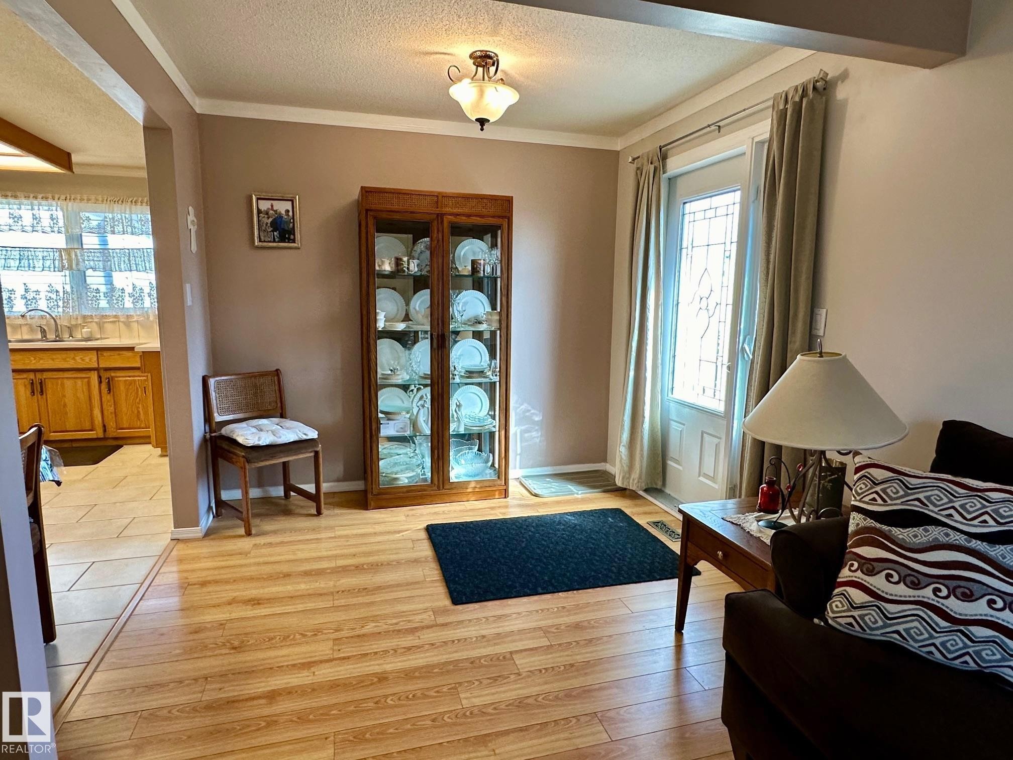 Leads to outside deck. - 7916 150 Avenue, Edmonton, AB - Indoor Photo Showing Other Room