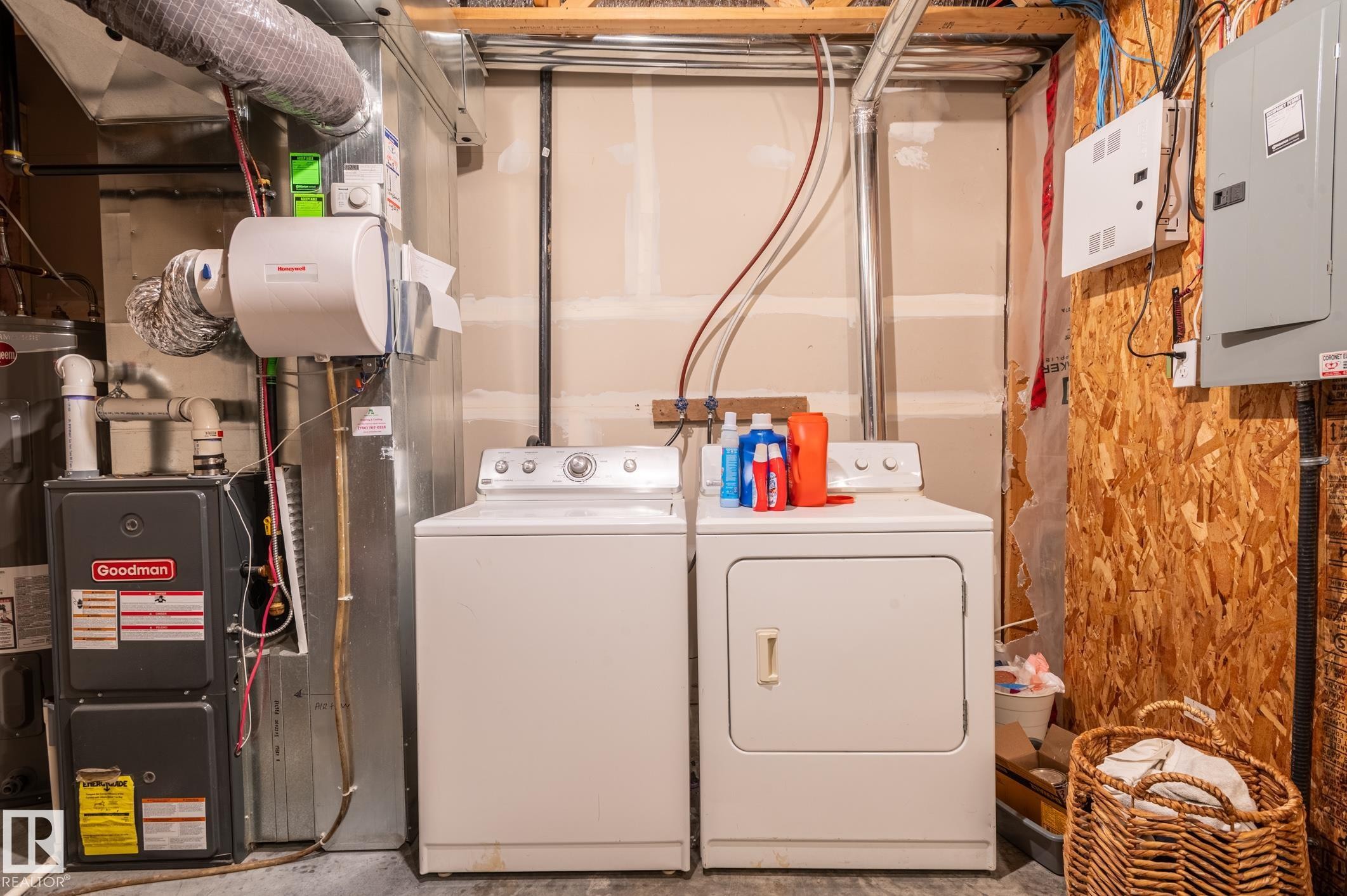 Utility area featuring a furnace system, water heater, and a humidifier - 46 465 Hemingway Road, Edmonton, AB