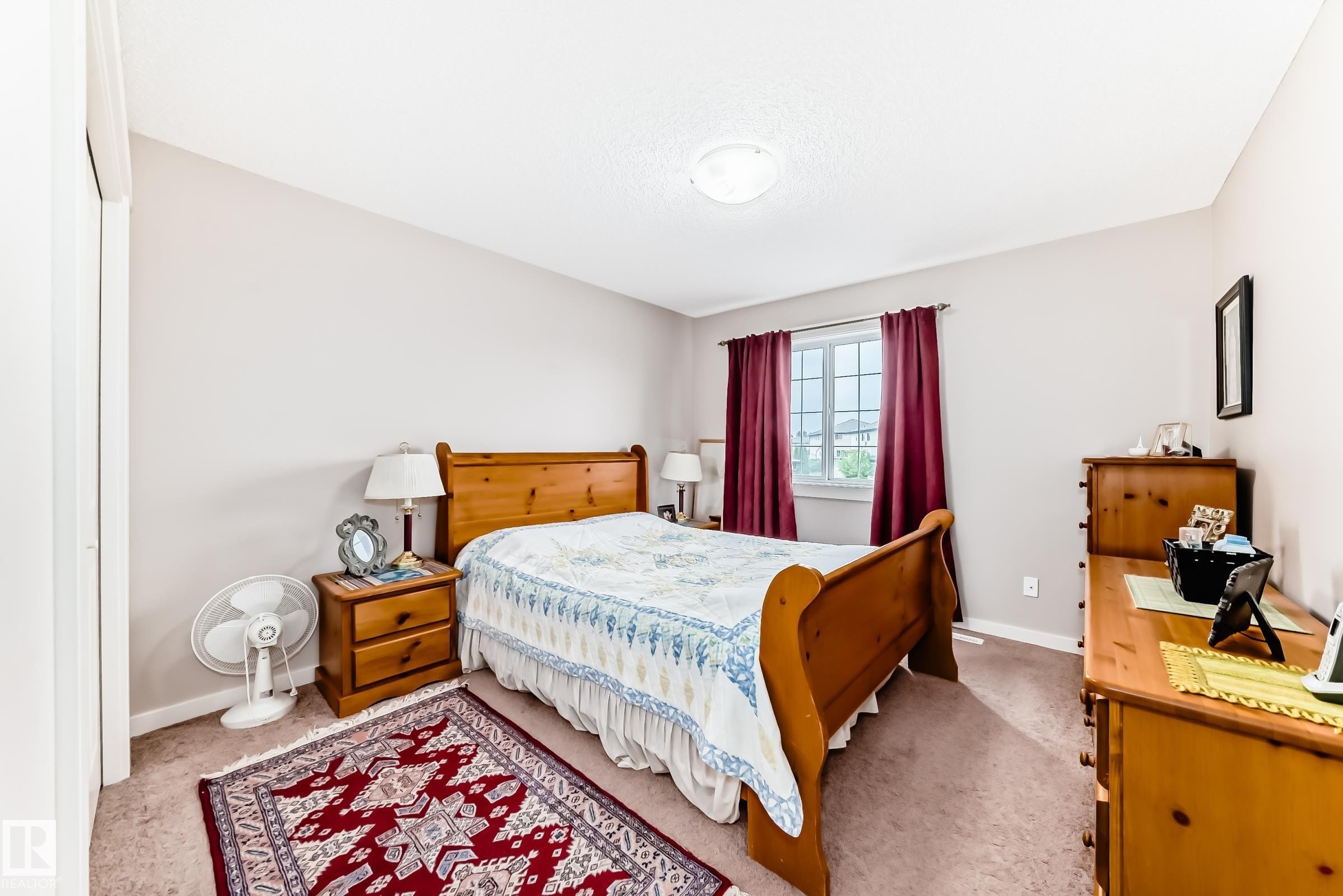 Bedroom with neutral wall tones and carpeted flooring - 2808 36 Avenue, Edmonton, AB