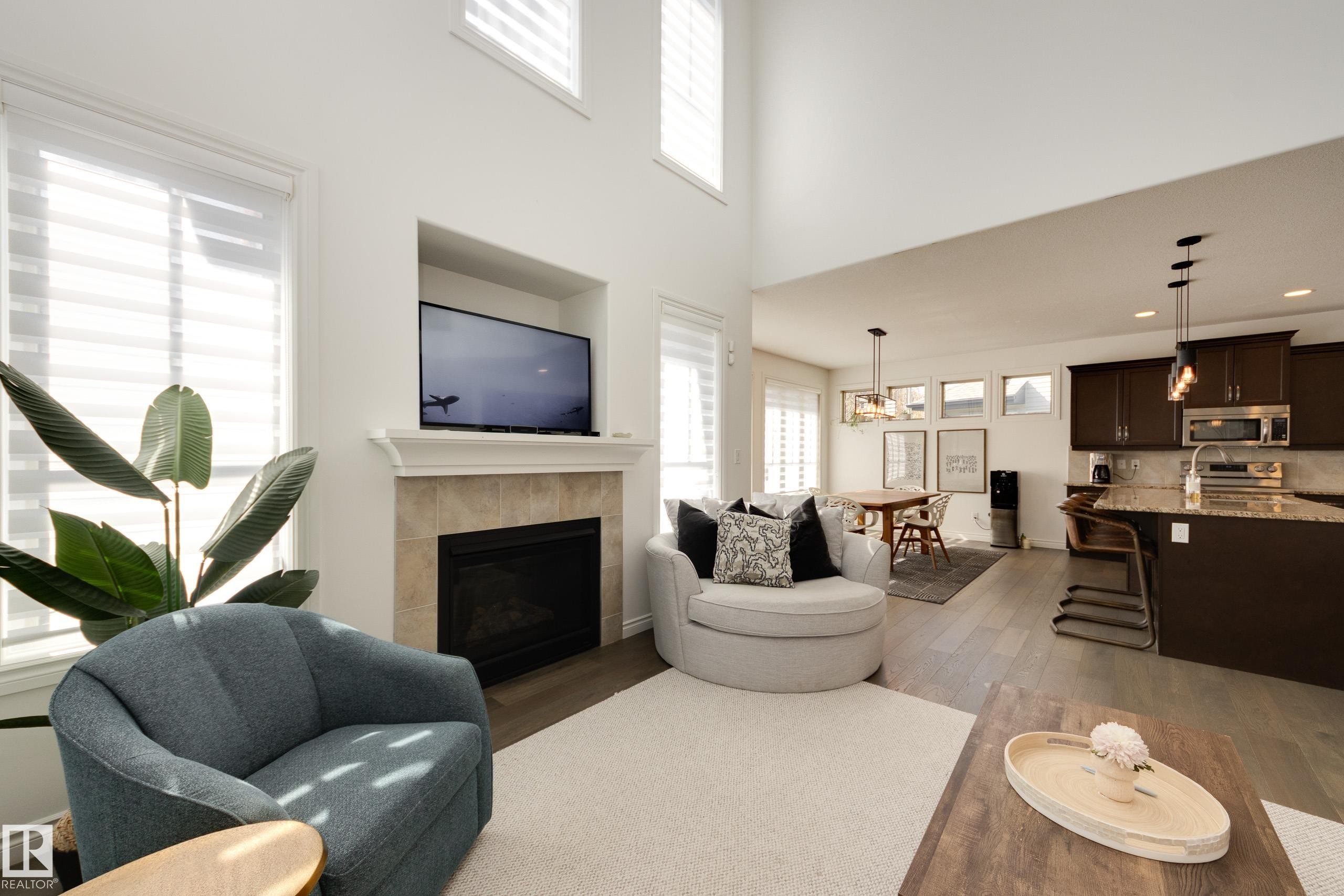 835 Armitage Wynd, Edmonton, AB - Indoor Photo Showing Living Room With Fireplace