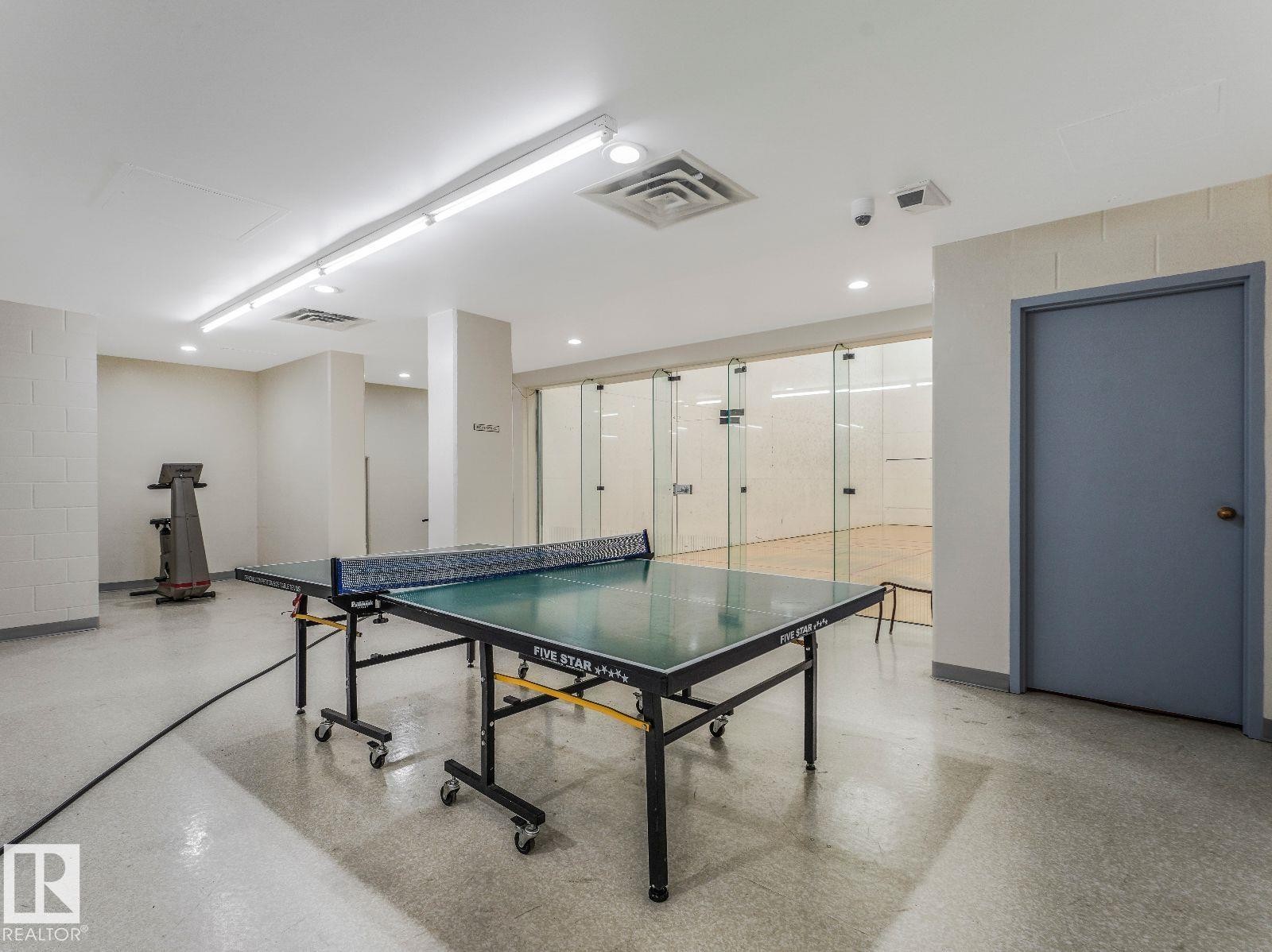 Recreational space featuring a ping-pong table and an adjacent glass-enclosed court - 806 10149 Saskatchewan Drive, Edmonton, AB