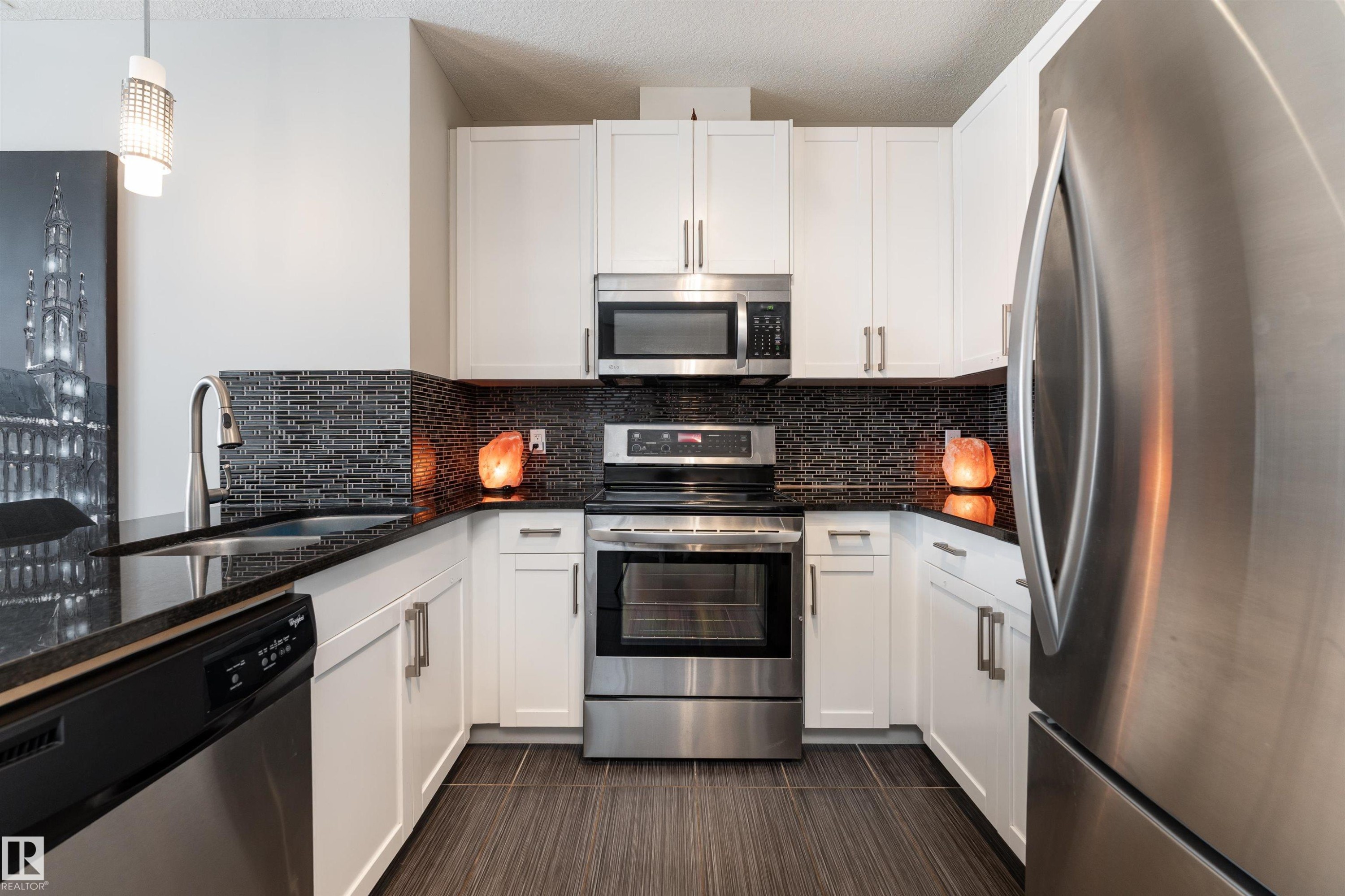 224 5151 Windermere Boulevard, Edmonton, AB - Indoor Photo Showing Kitchen With Stainless Steel Kitchen With Upgraded Kitchen