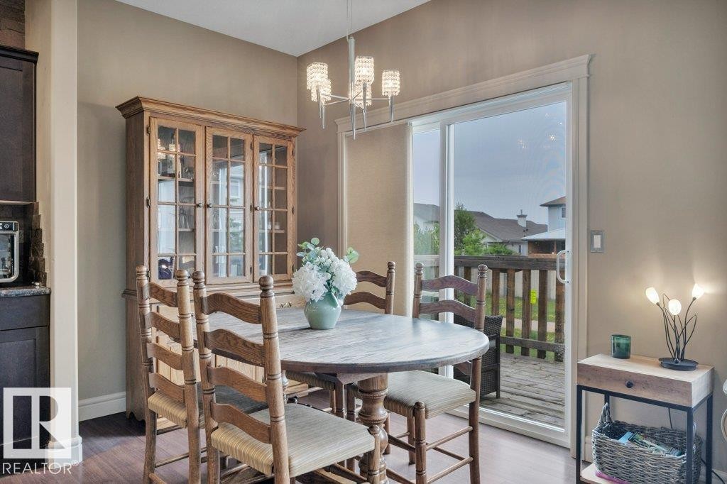 Just off west-facing deck - 10 15151 43 Street, Edmonton, AB - Indoor Photo Showing Dining Room