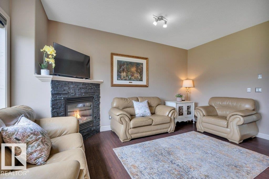 10 15151 43 Street, Edmonton, AB - Indoor Photo Showing Living Room With Fireplace