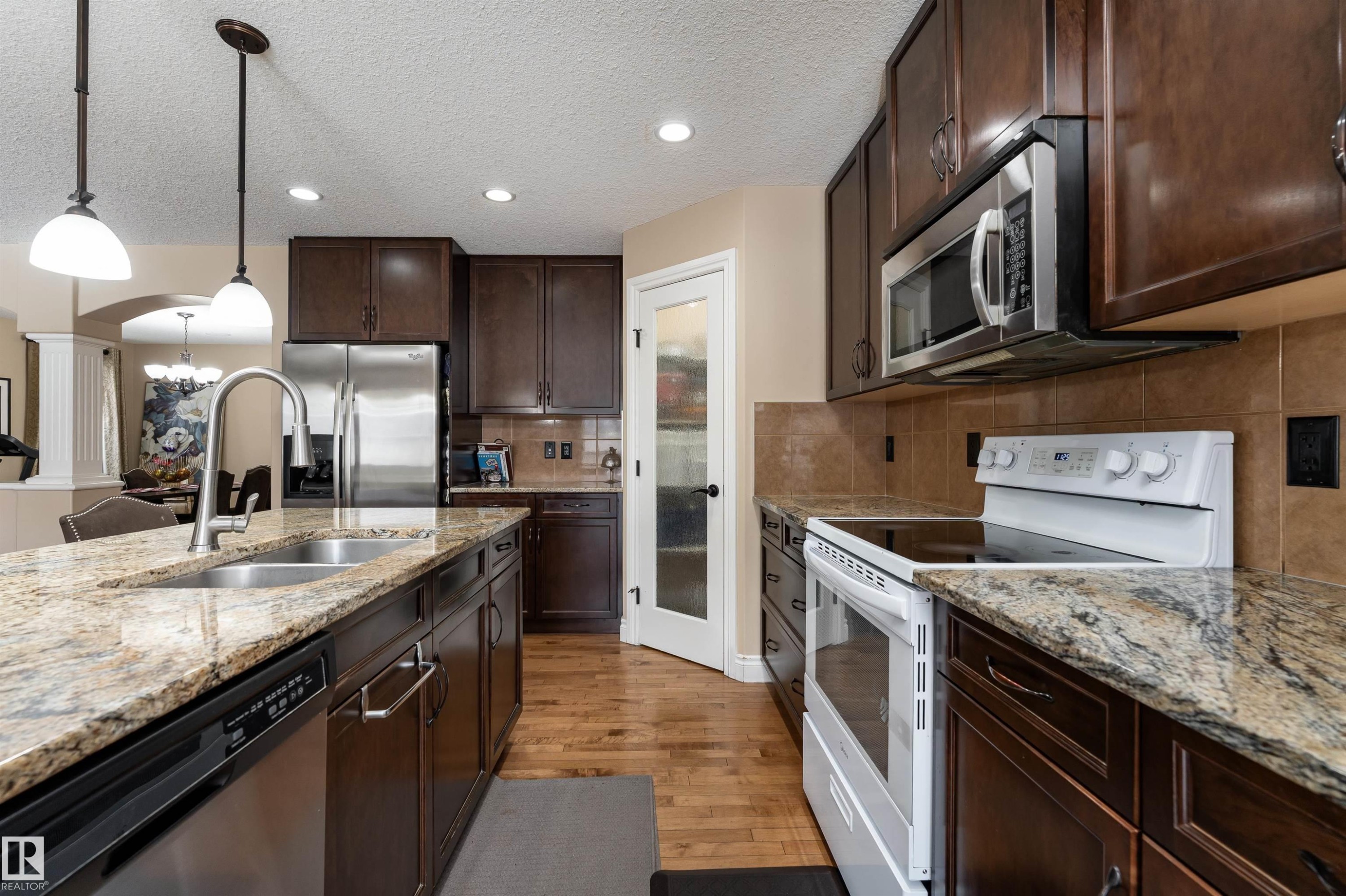 729 37A Avenue, Edmonton, AB - Indoor Photo Showing Kitchen With Double Sink