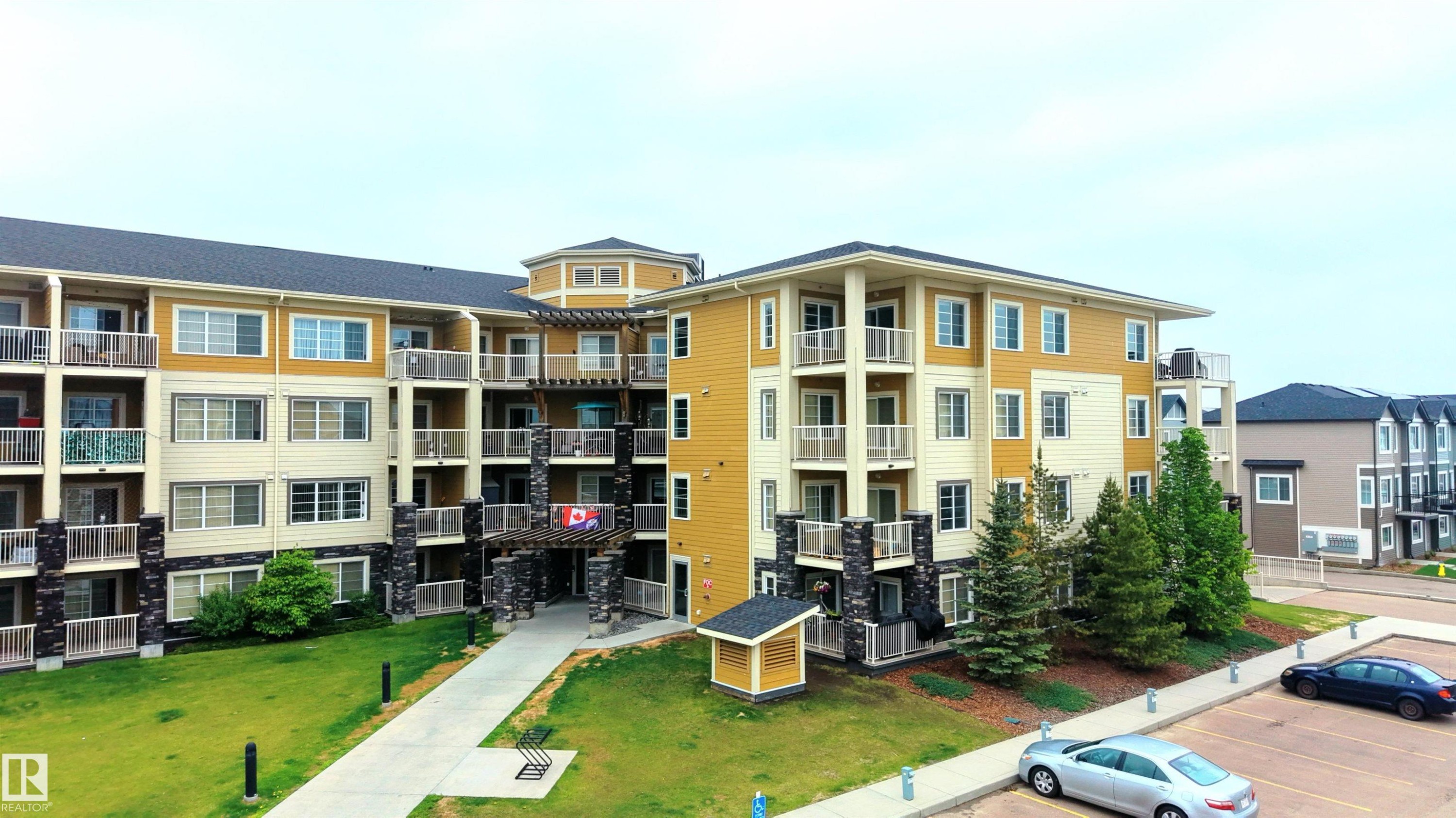 #115 3670 139 Av Nw, Edmonton, AB - Outdoor With Balcony With Facade
