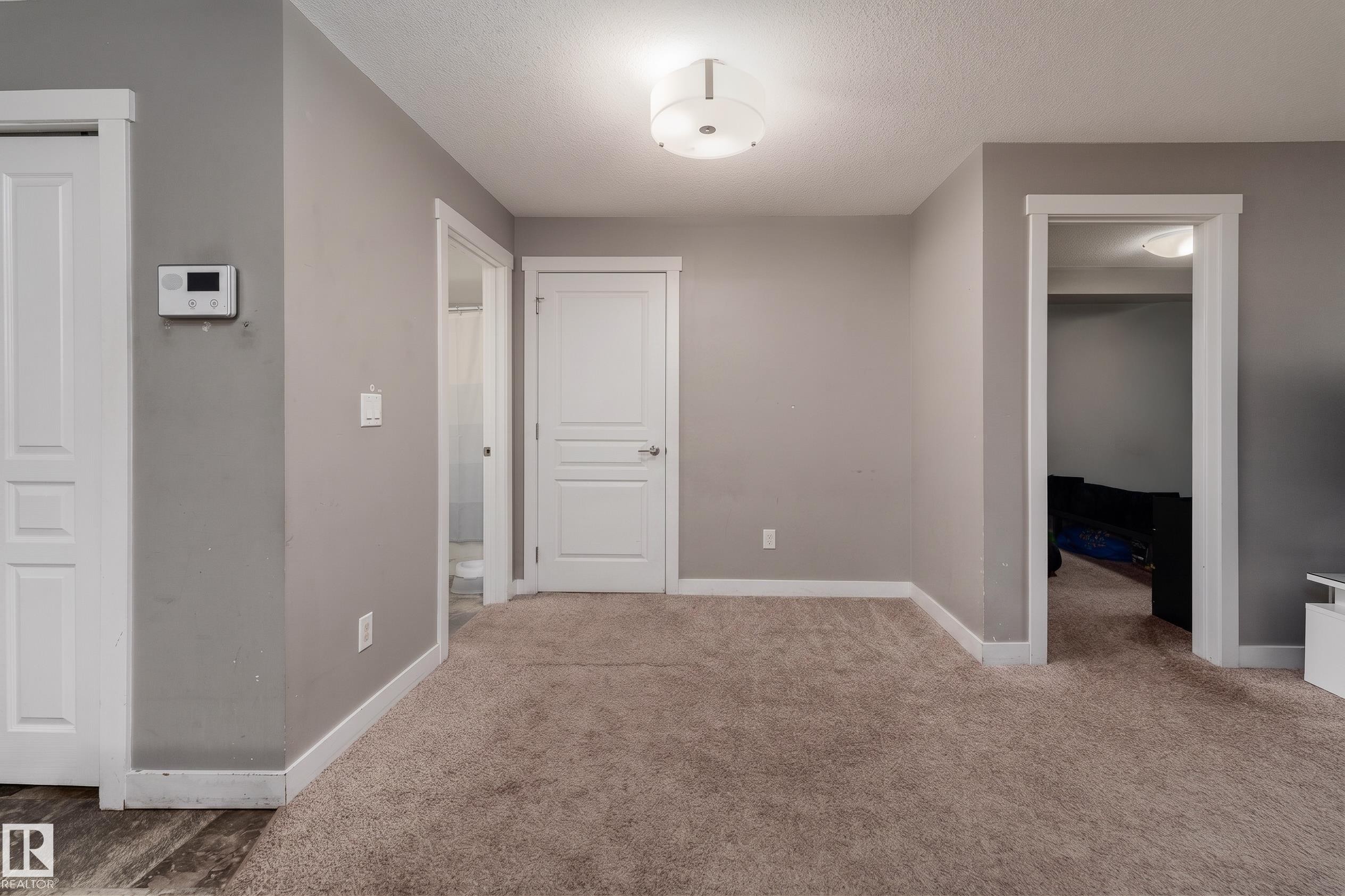 #115 3670 139 Av Nw, Edmonton, AB - Indoor Photo Showing Other Room