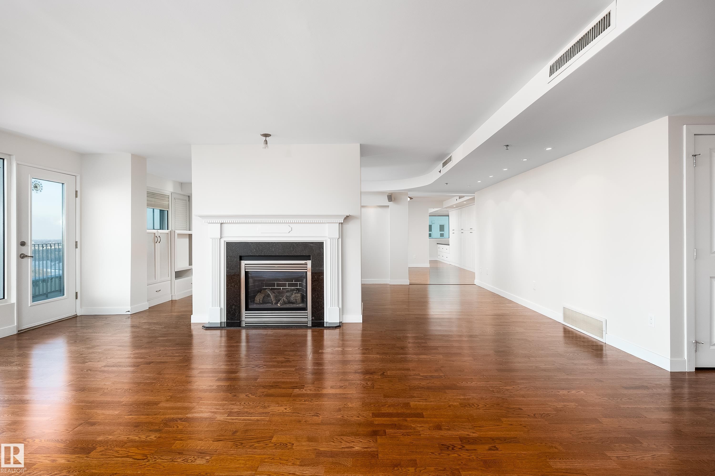 #1402 10731 Saskatchewan Dr Nw, Edmonton, AB - Indoor Photo Showing Living Room With Fireplace