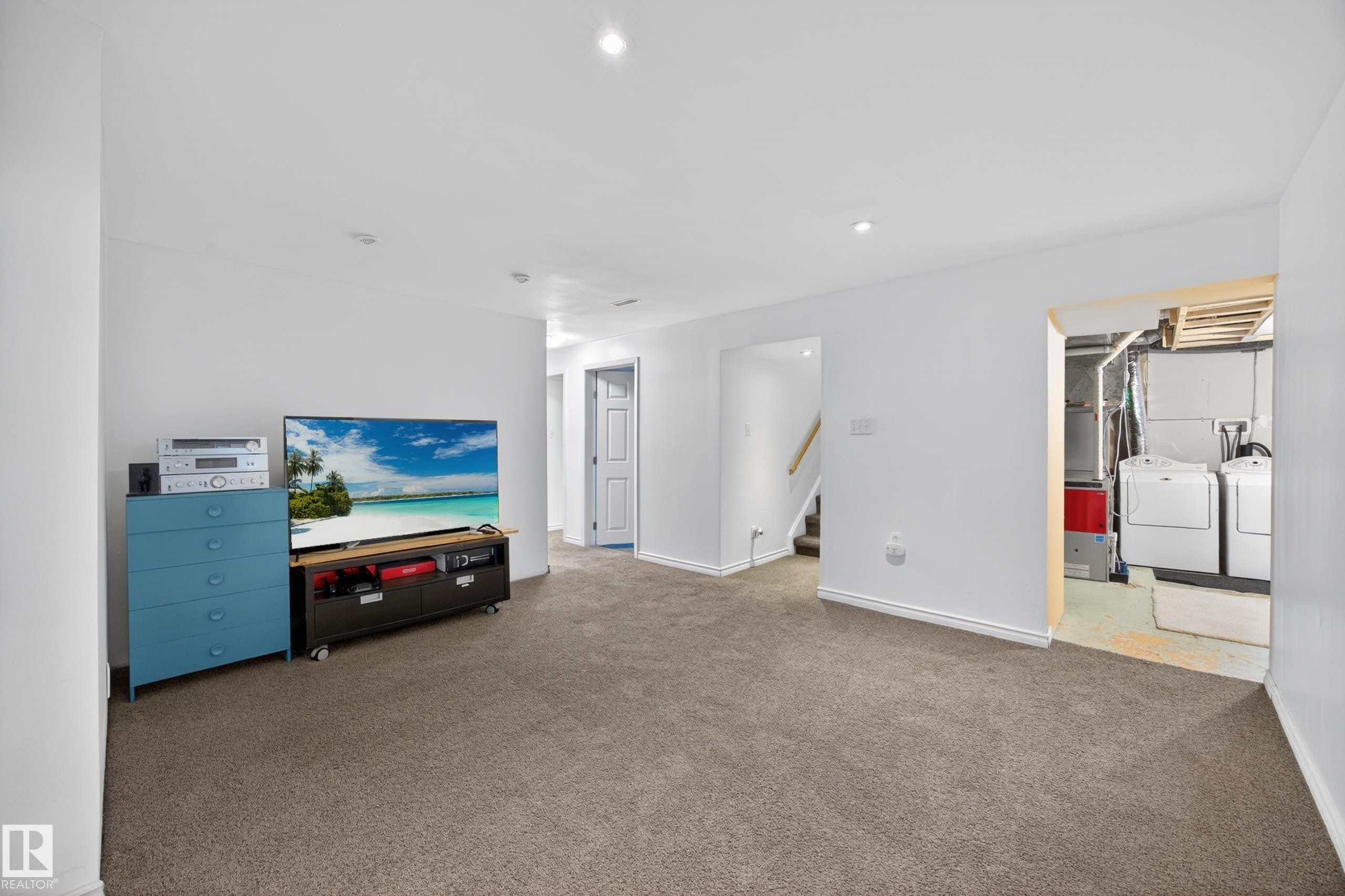 Carpeted room featuring white walls and recessed lighting - 5216 104A Street, Edmonton, AB - Indoor