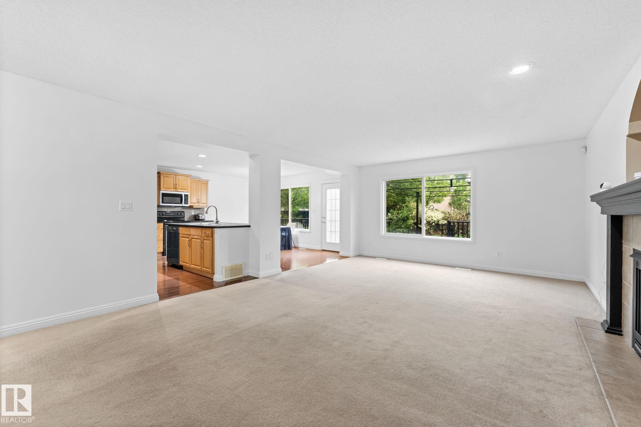 1951 120 Street Sw, Edmonton, AB - Indoor Photo Showing Living Room With Fireplace