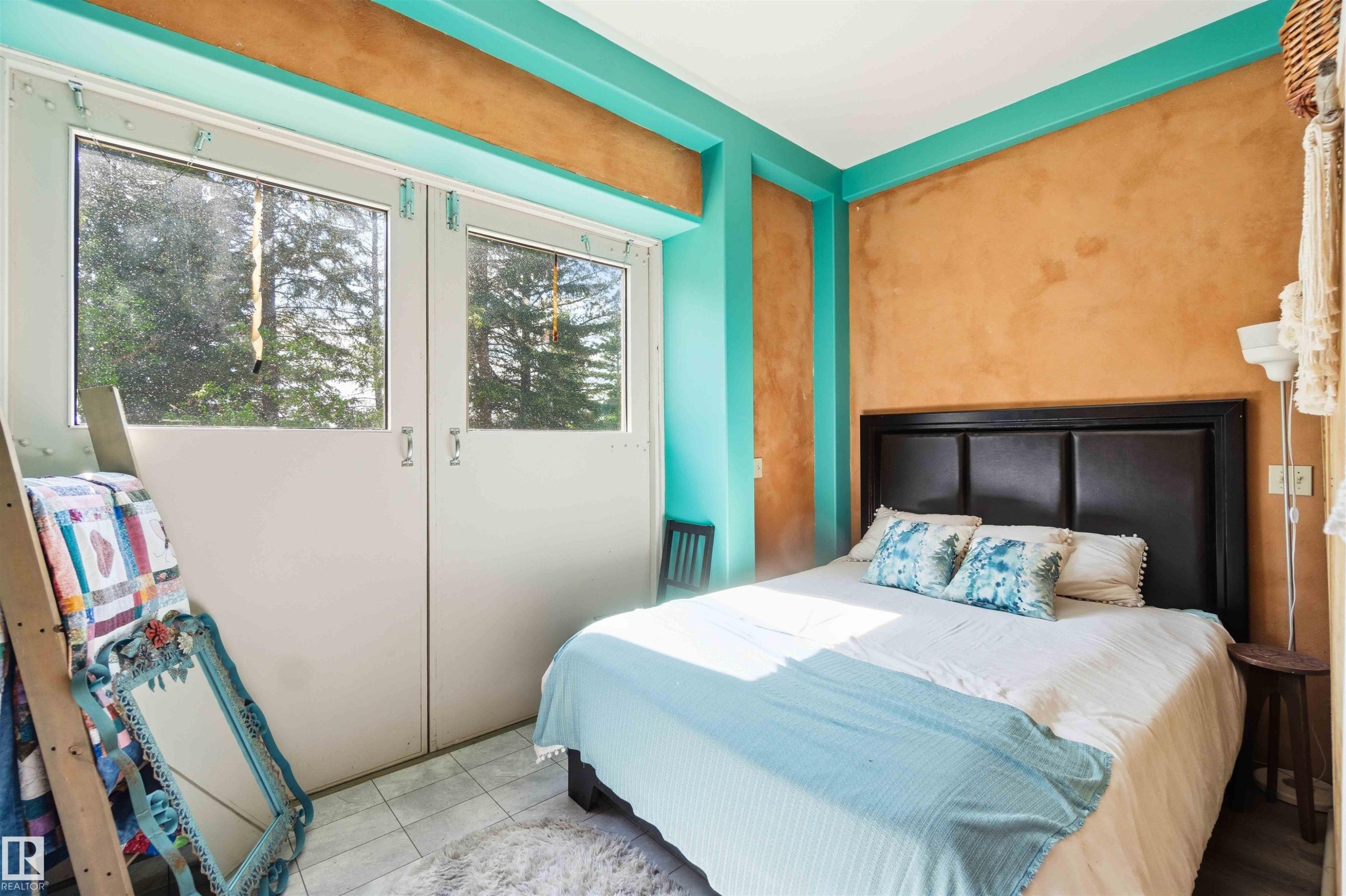 Interior space featuring large double doors with upper window panes - #17 A 15031 Twp Road 462, Rural Wetaskiwin County, AB - Indoor Photo Showing Other Room