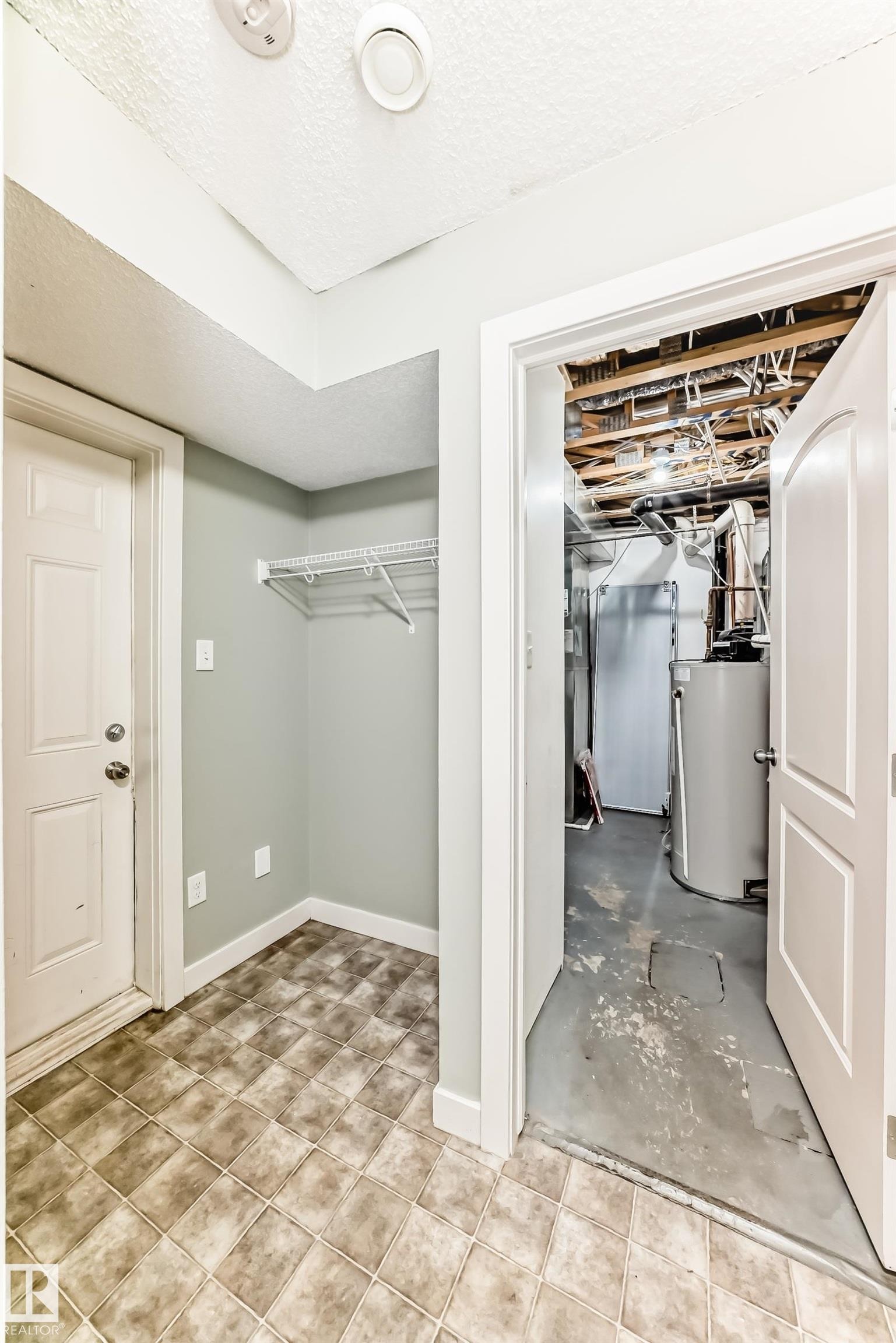 Basement, Entry to Garage & Laundry/Utility Room - #47 12004 22 Av Sw, Edmonton, AB - Indoor