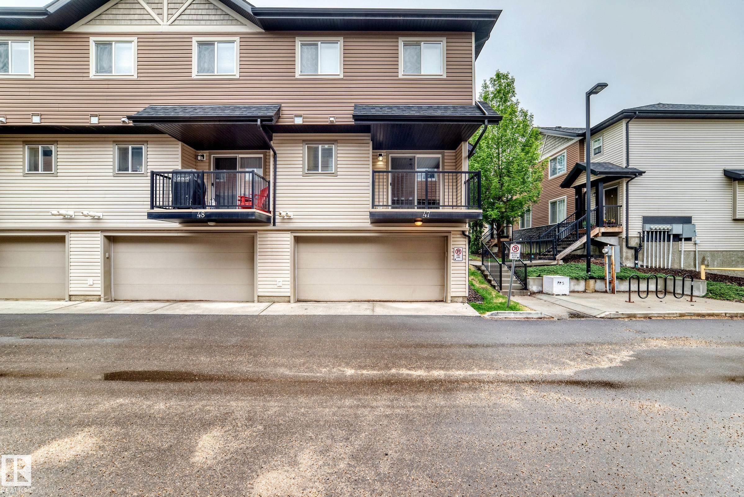#47 12004 22 Av Sw, Edmonton, AB - Outdoor With Balcony With Facade
