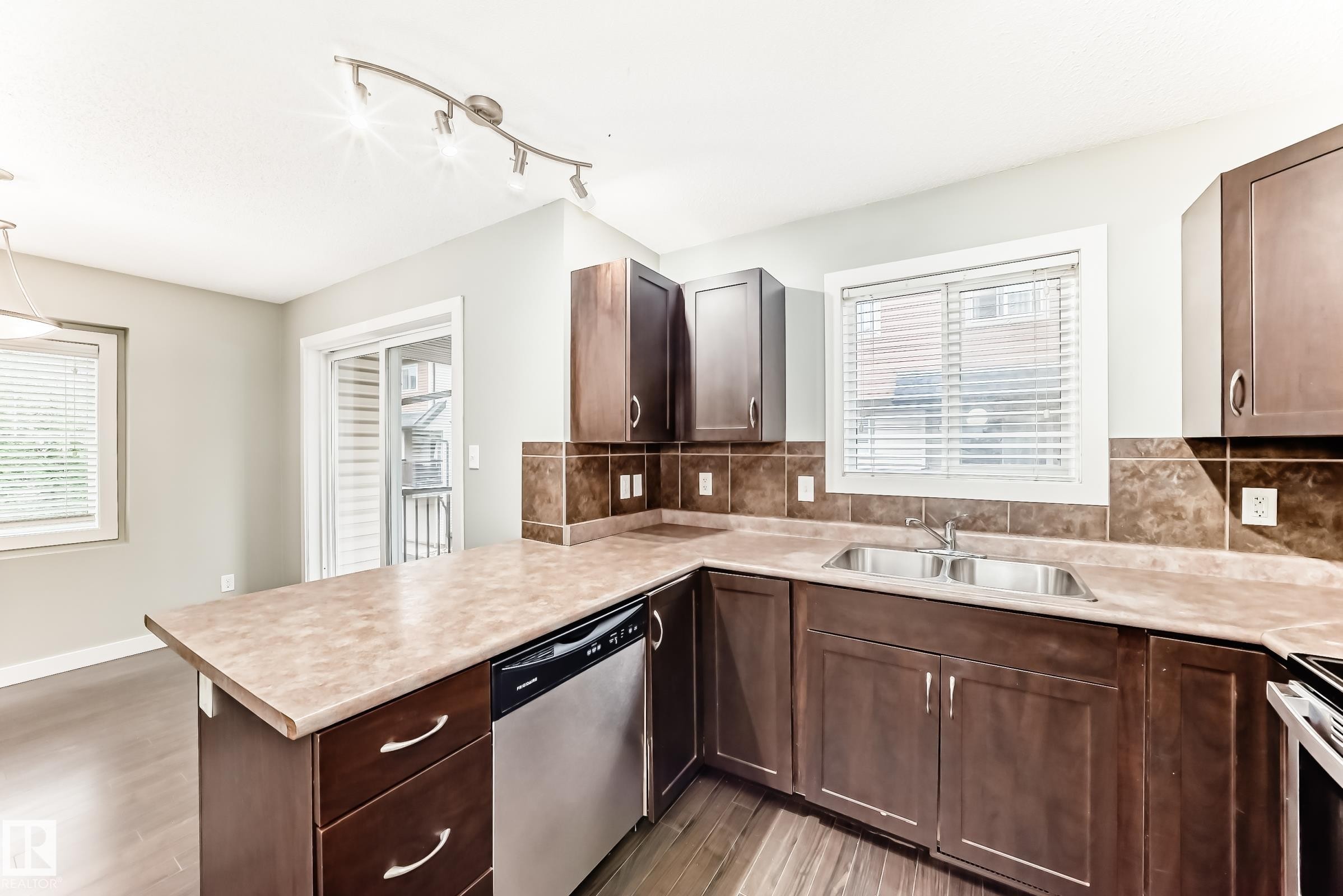#47 12004 22 Av Sw, Edmonton, AB - Indoor Photo Showing Kitchen With Double Sink