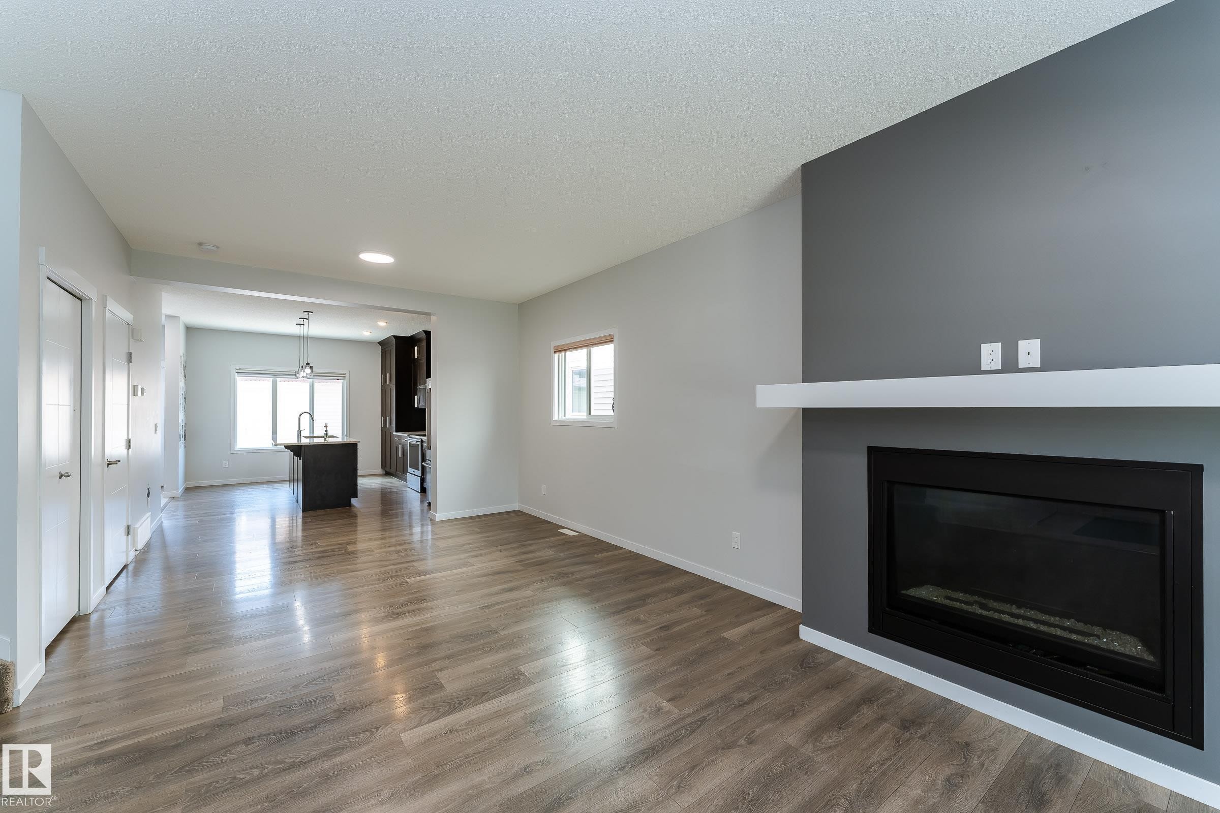 4022 Allan Crescent Sw, Edmonton, AB - Indoor Photo Showing Living Room With Fireplace