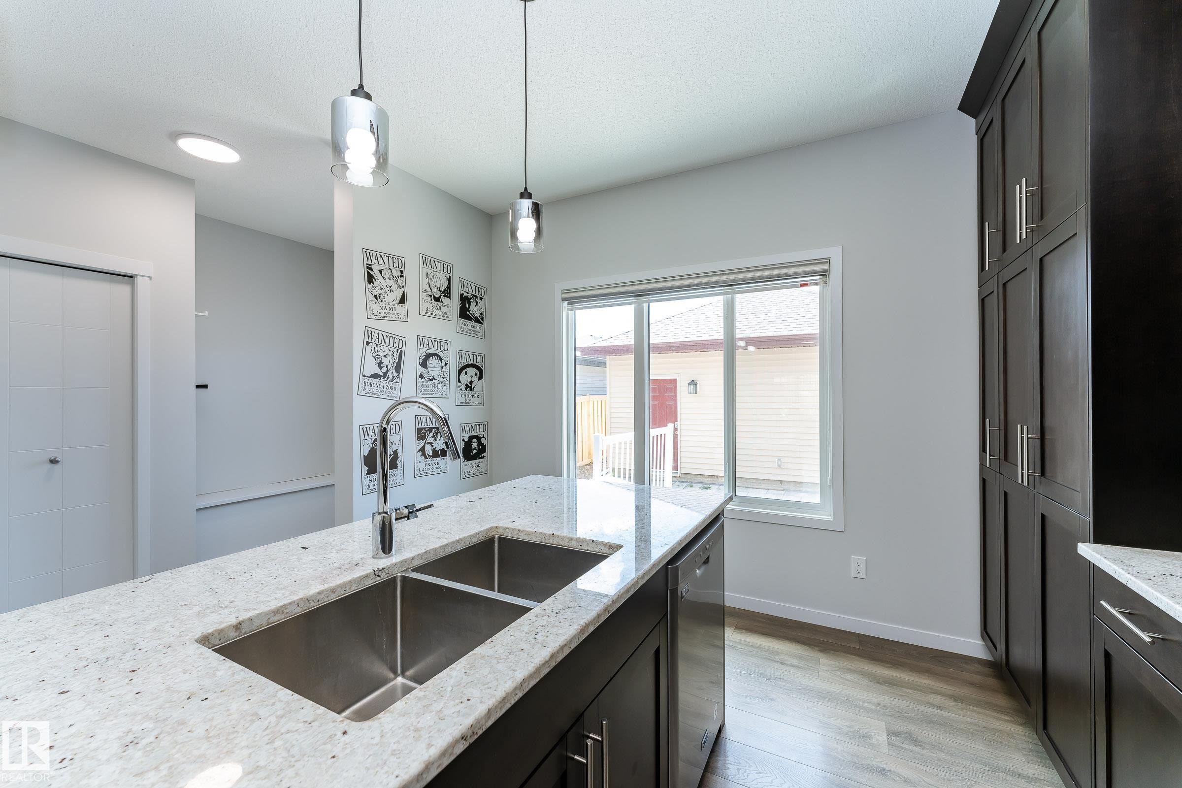 4022 Allan Crescent Sw, Edmonton, AB - Indoor Photo Showing Kitchen With Double Sink