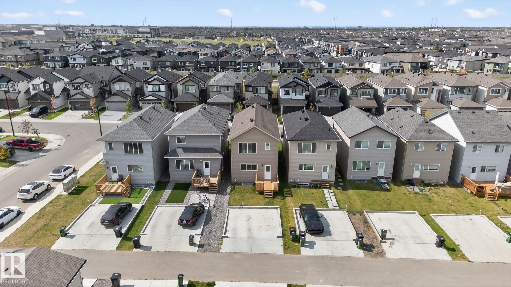 Modern residential area featuring a collection of detached homes with varied exterior finishes - 1213 16A Street, Edmonton, AB
