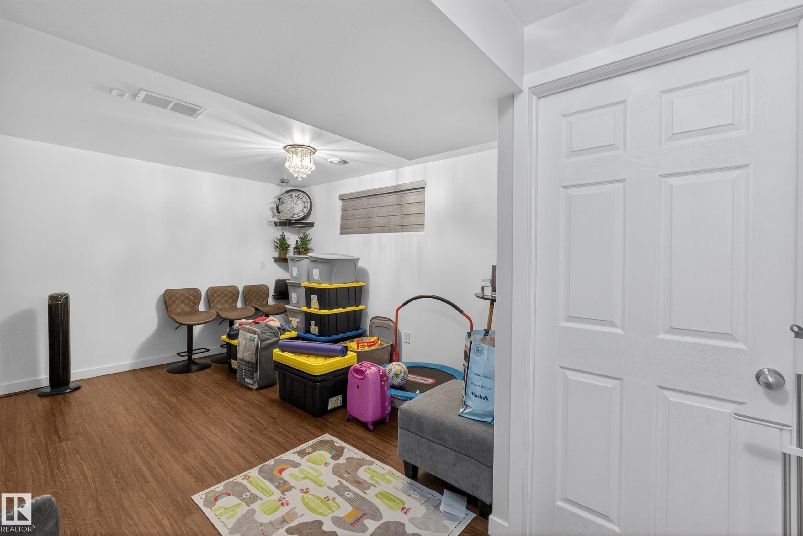 Hardwood-style flooring throughout - 1404 25 Avenue, Edmonton, AB