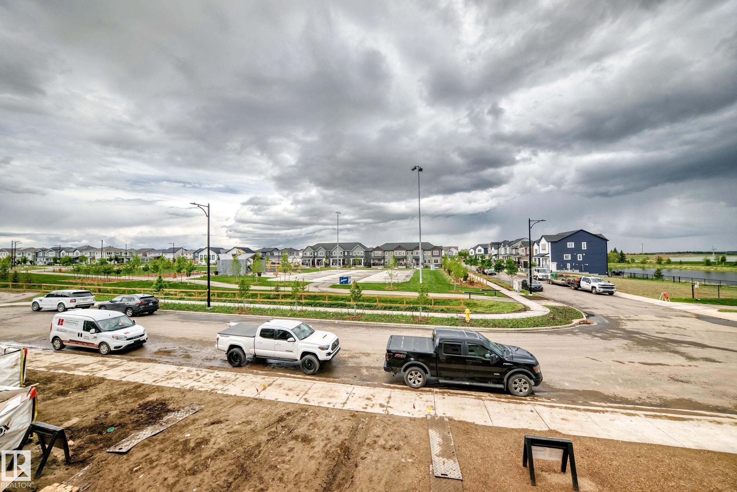 Developing neighborhood featuring a variety of residential structures and a broad streetscape with sidewalks - 1210 Stoneside Road, Sherwood Park, AB - Outdoor With View