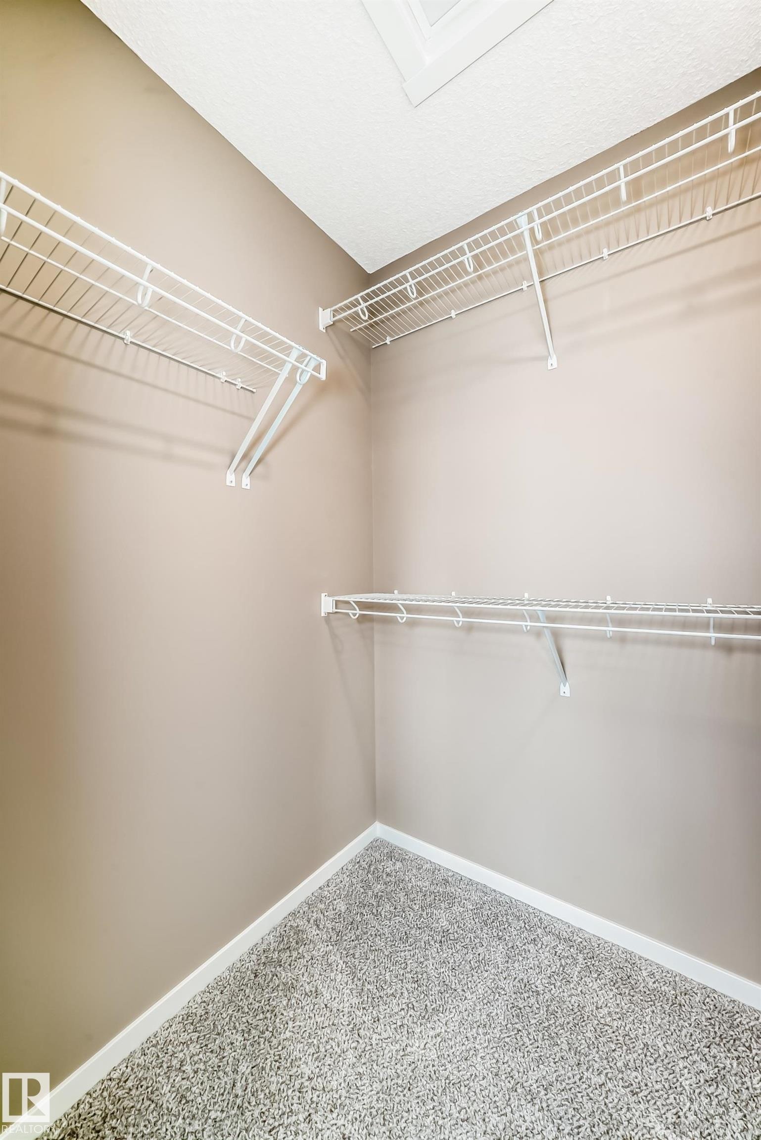 Walk in closet - 1210 Stoneside Road, Sherwood Park, AB - Indoor With Storage