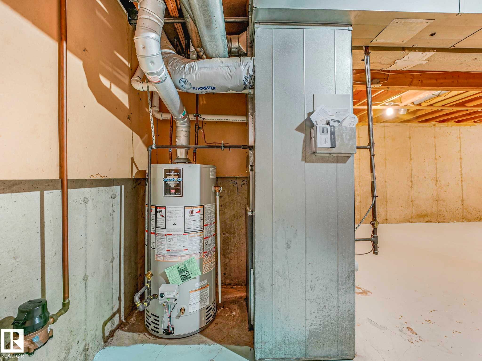 Hi-efficient furnace and newer hot water tank. - 17108 100 Street, Edmonton, AB