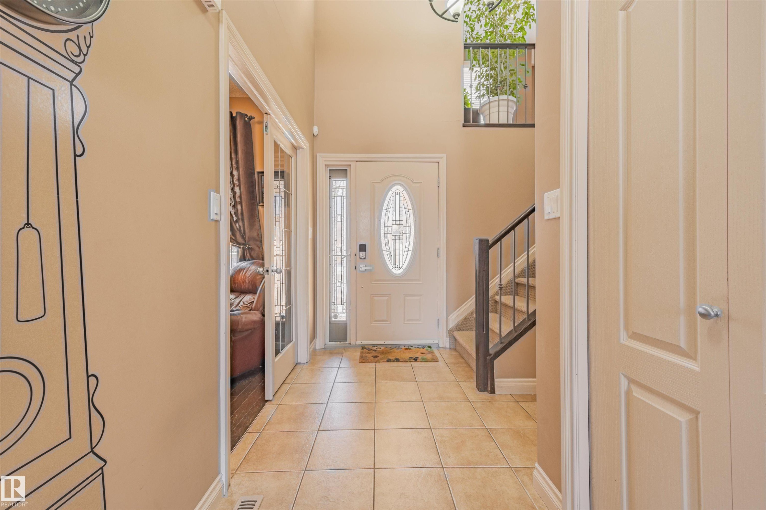 Main entrance (view from inside). - 57 Homestead Crescent Nw, Edmonton, AB - Indoor Photo Showing Other Room