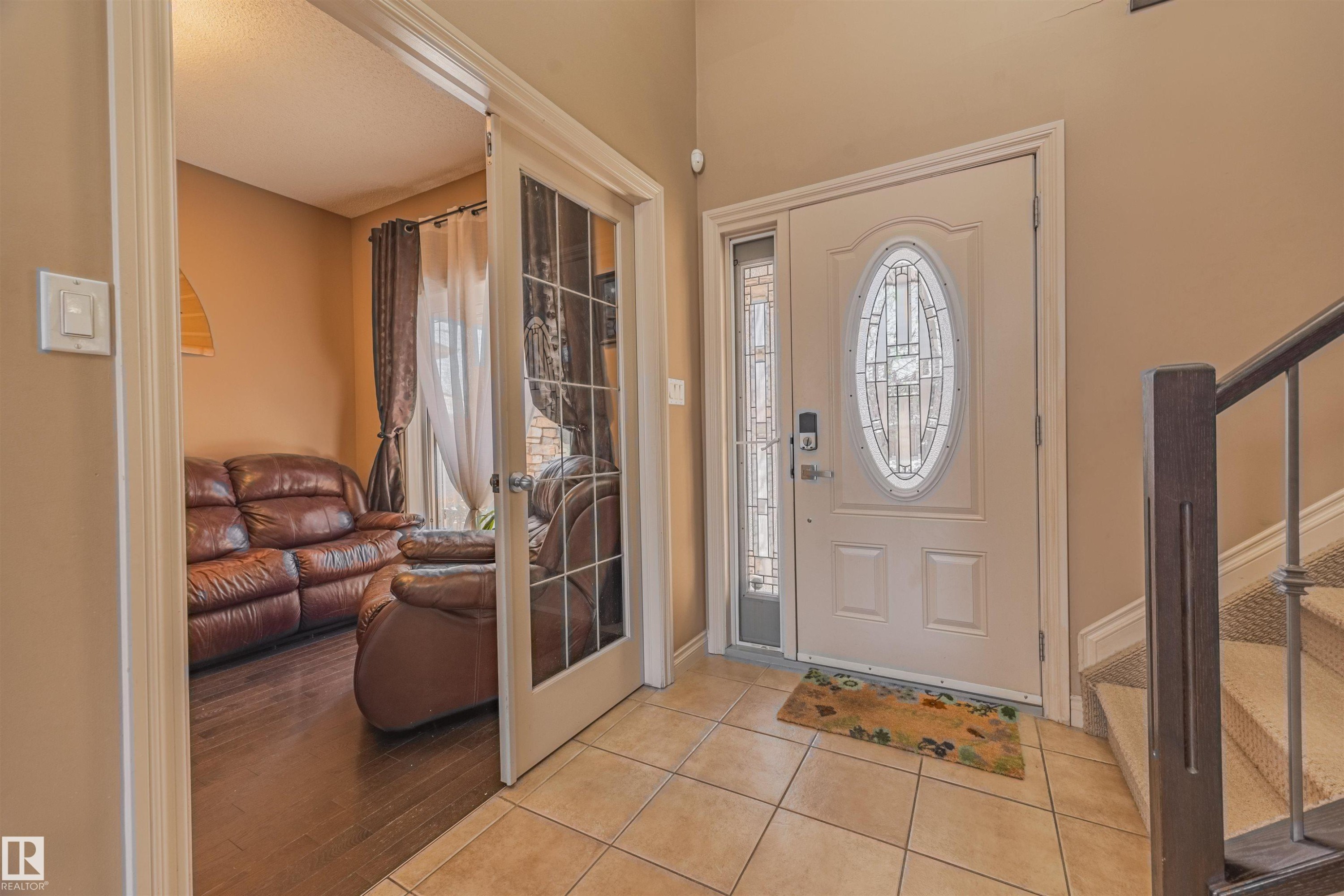 Main floor office located near front door. - 57 Homestead Crescent Nw, Edmonton, AB - Indoor Photo Showing Other Room