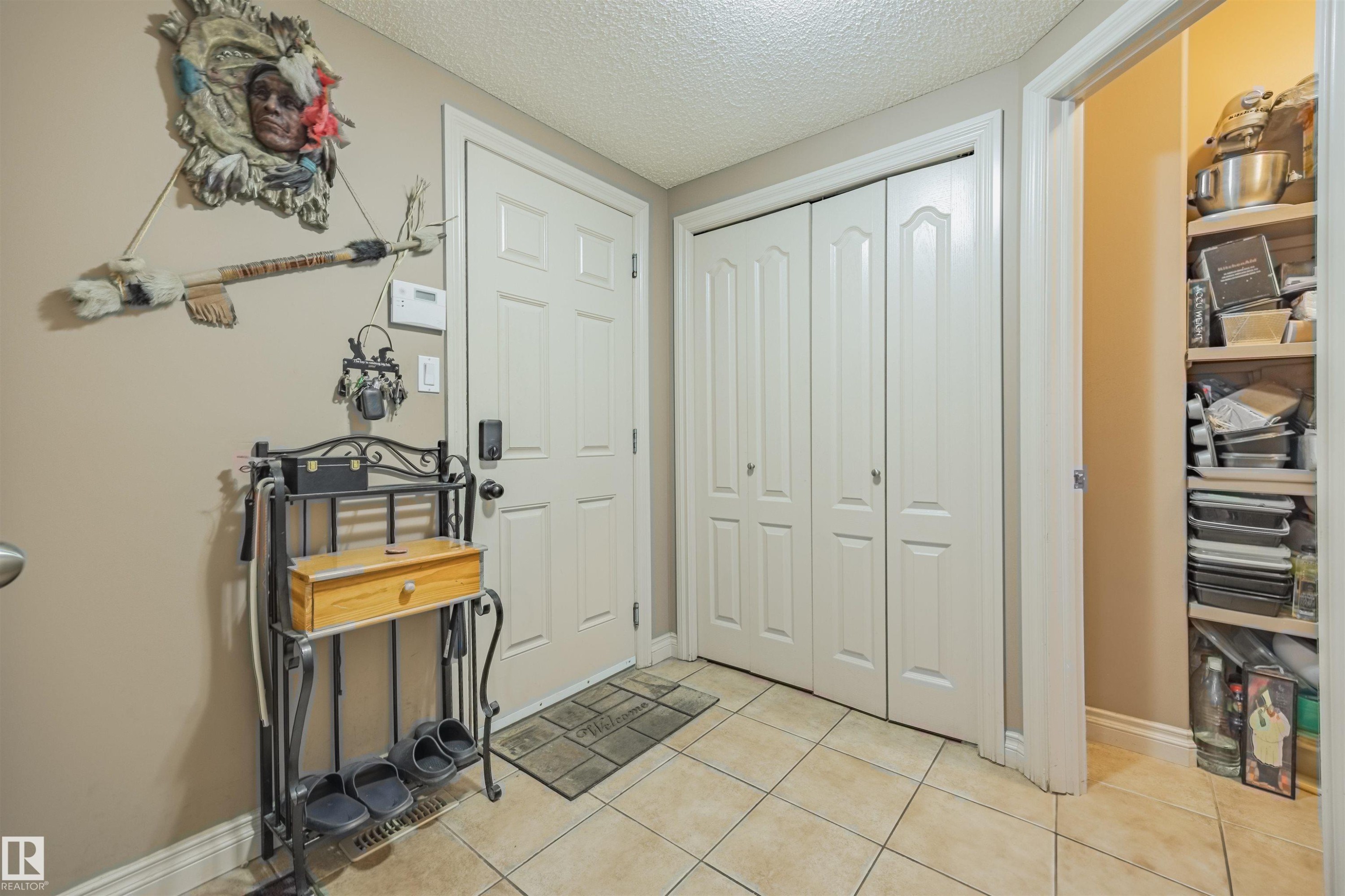 Entryway to the garage. - 57 Homestead Crescent Nw, Edmonton, AB - Indoor Photo Showing Other Room