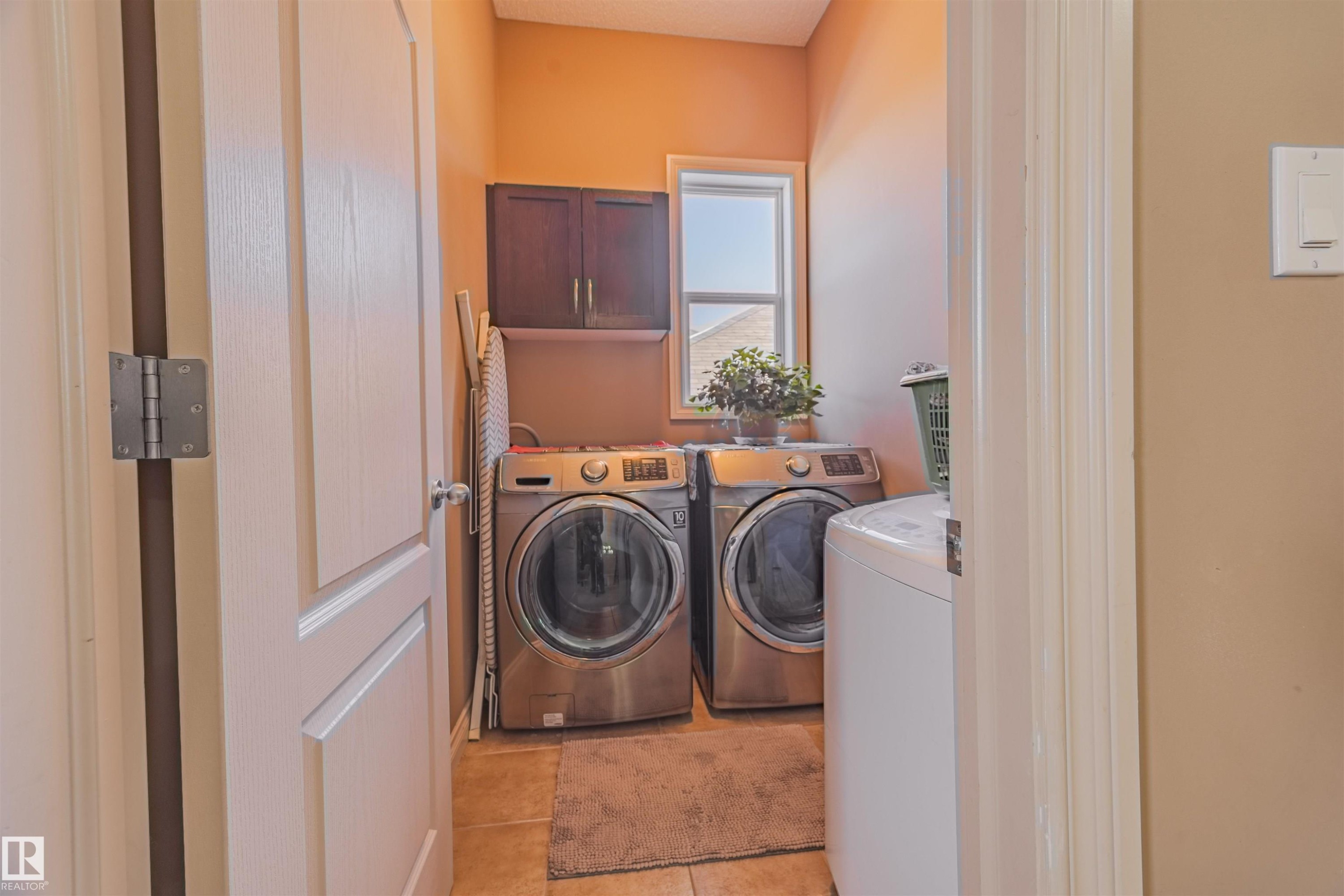 Washer and Dryer purchased in 2020. - 57 Homestead Crescent Nw, Edmonton, AB - Indoor Photo Showing Laundry Room