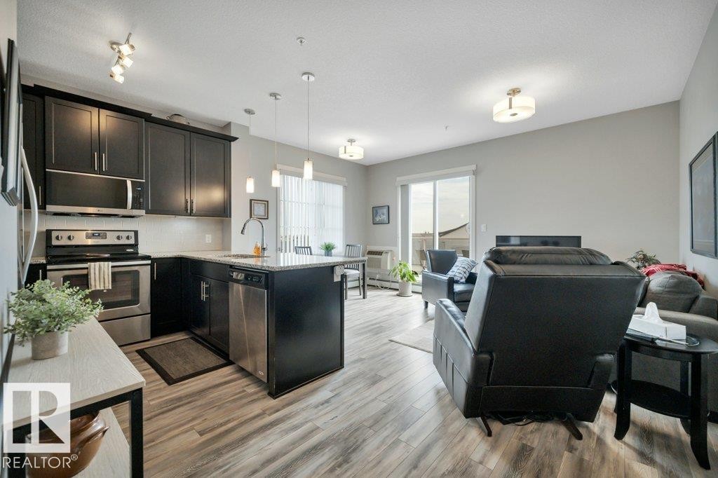 402 812 Welsh Drive Sw, Edmonton, AB - Indoor Photo Showing Kitchen With Upgraded Kitchen