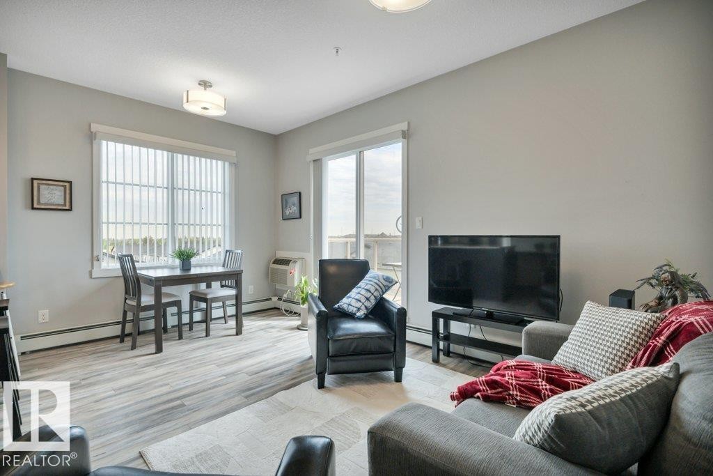 402 812 Welsh Drive Sw, Edmonton, AB - Indoor Photo Showing Living Room