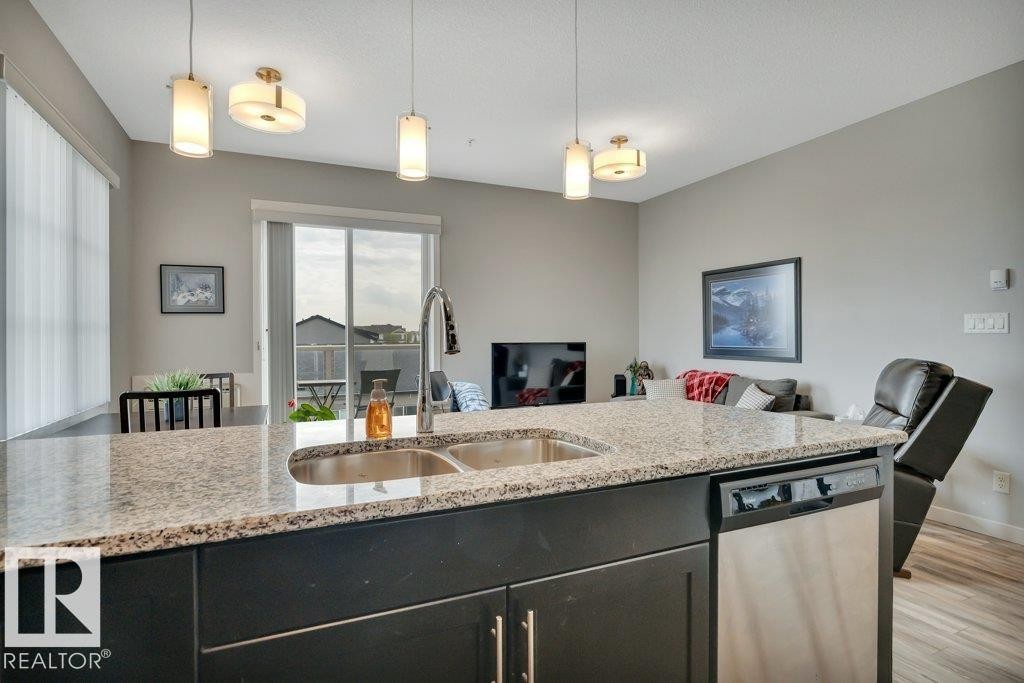 402 812 Welsh Drive Sw, Edmonton, AB - Indoor Photo Showing Kitchen With Double Sink