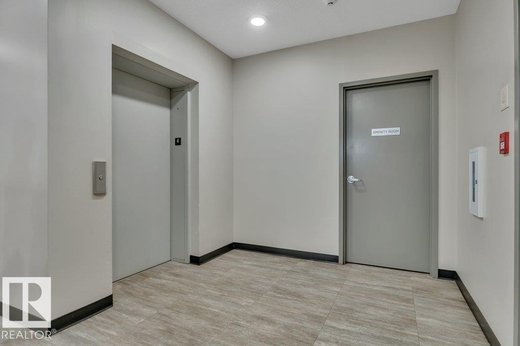 402 812 Welsh Drive Sw, Edmonton, AB - Indoor Photo Showing Other Room