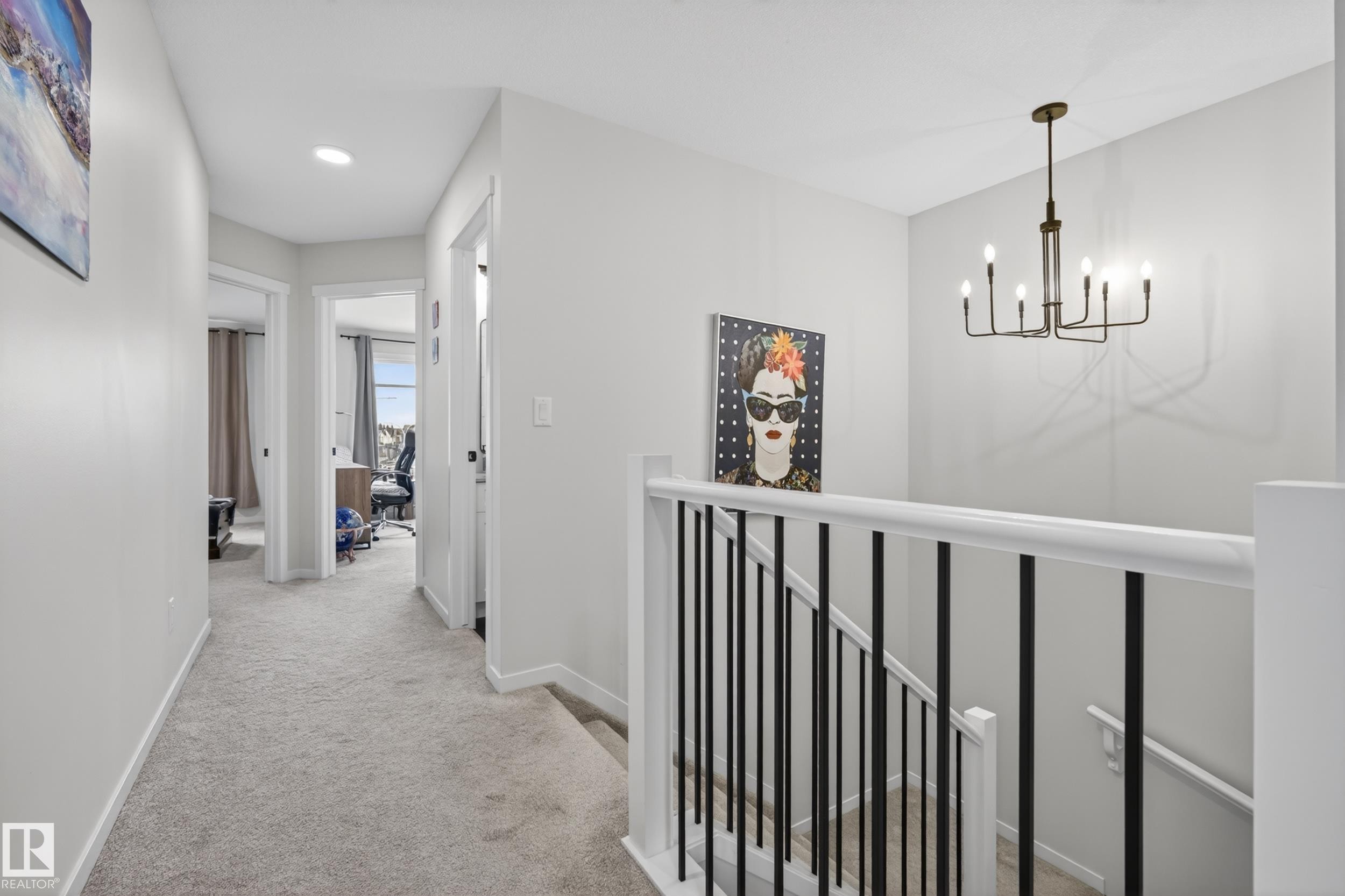 Upper-level hallway featuring light gray carpeting and recessed lighting - 22836 94 Avenue, Edmonton, AB