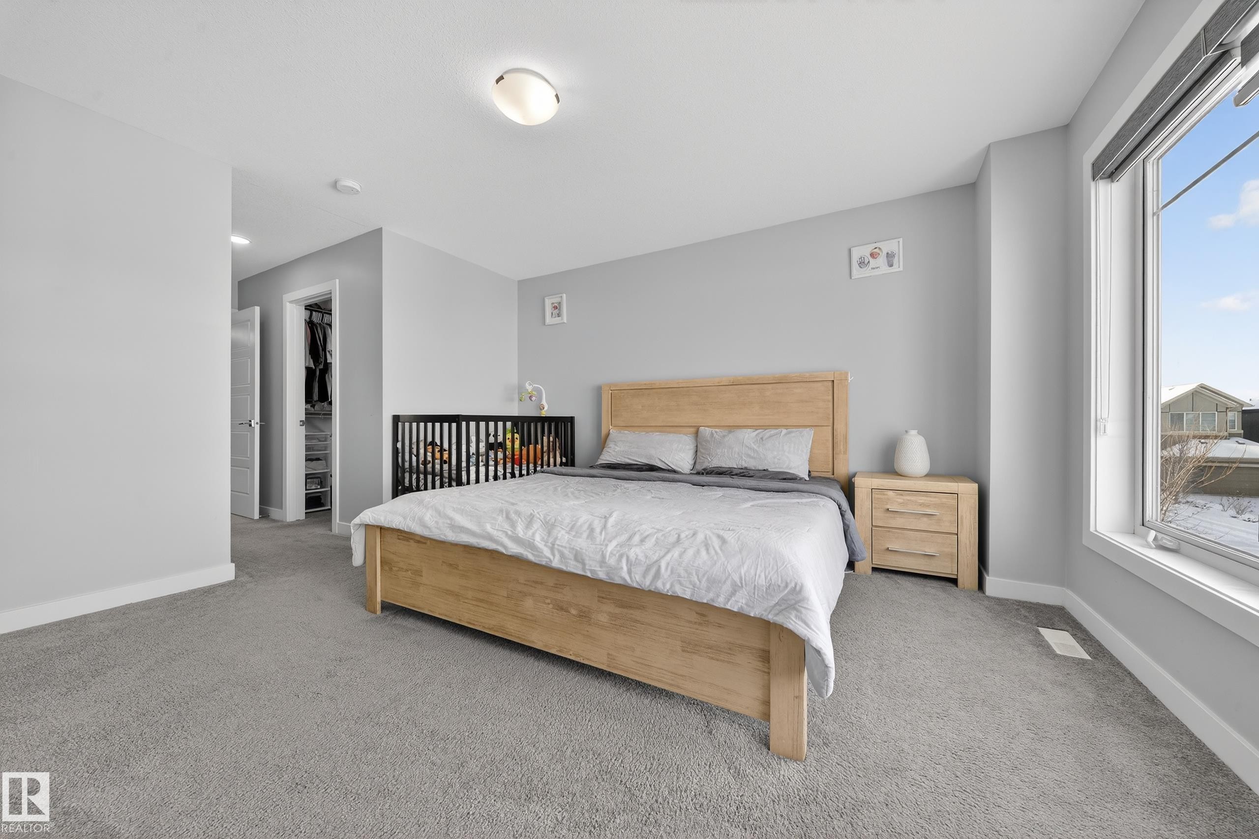 Room featuring light gray carpet flooring and neutral wall tones - 2084 Graydon Hill, Edmonton, AB