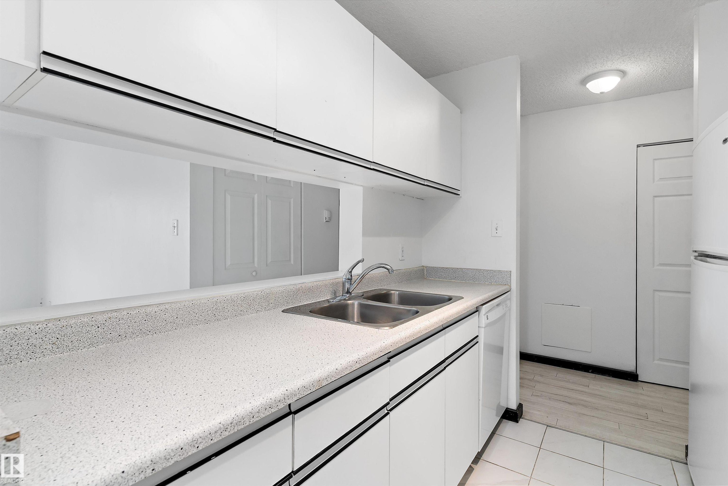 #420 6720 158 Av Nw, Edmonton, AB - Indoor Photo Showing Kitchen With Double Sink
