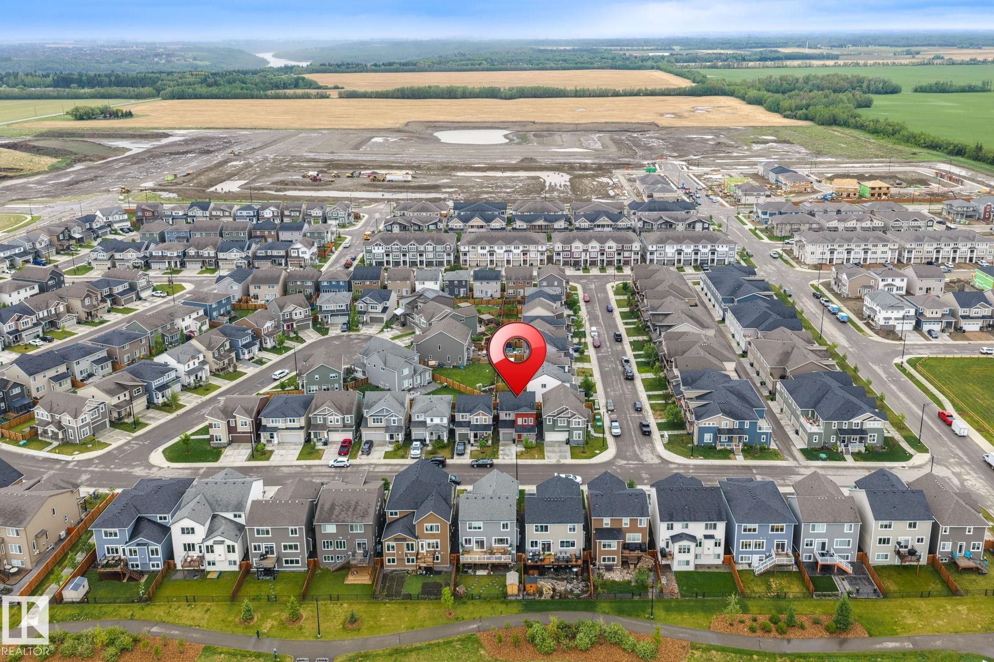 Residential neighborhood featuring modern detached and attached homes - 20227 17Ave, Edmonton, AB