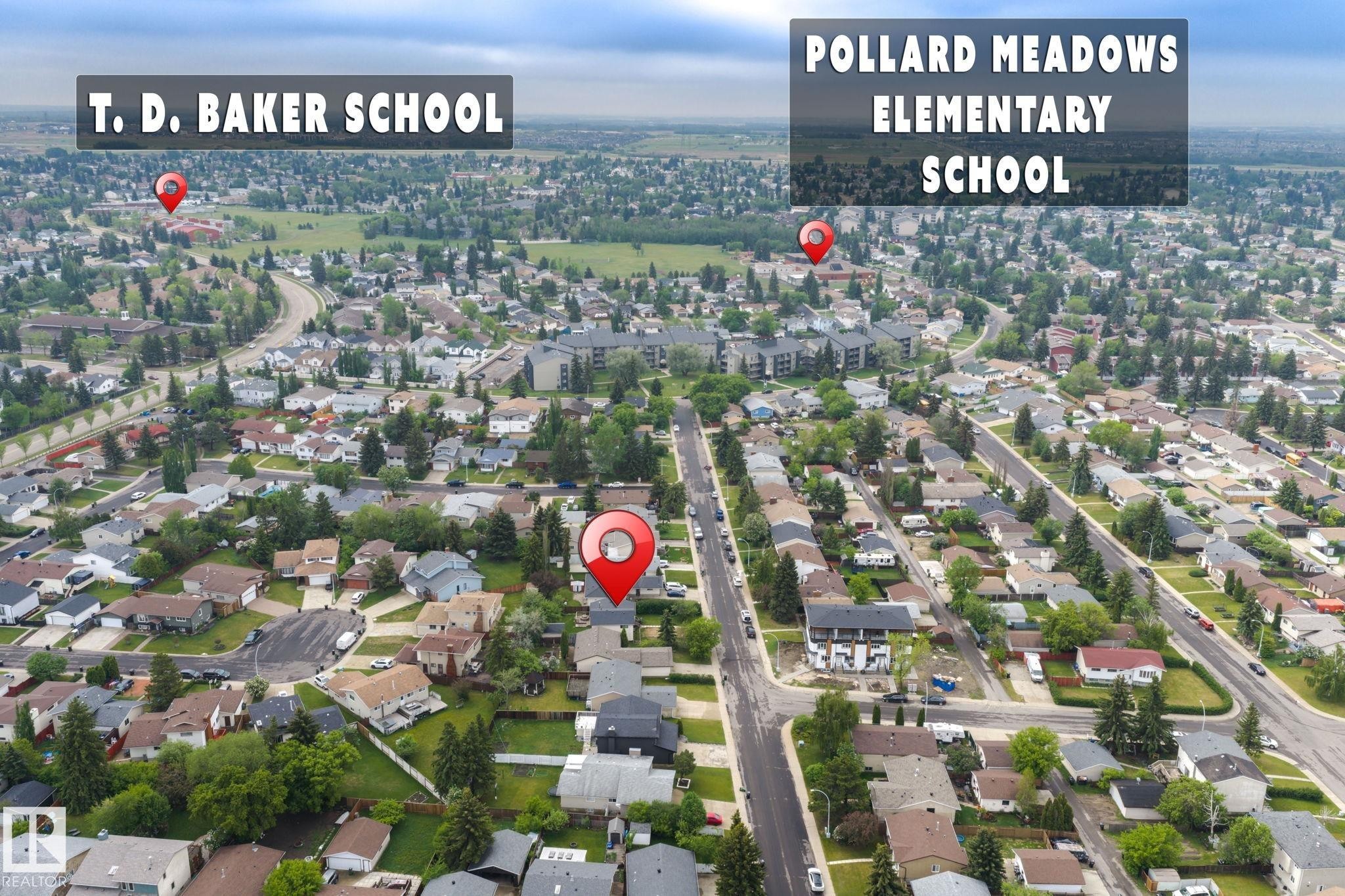 Aerial perspective highlighting a residential neighborhood with established homes and mature trees - 2045 46St, Edmonton, AB