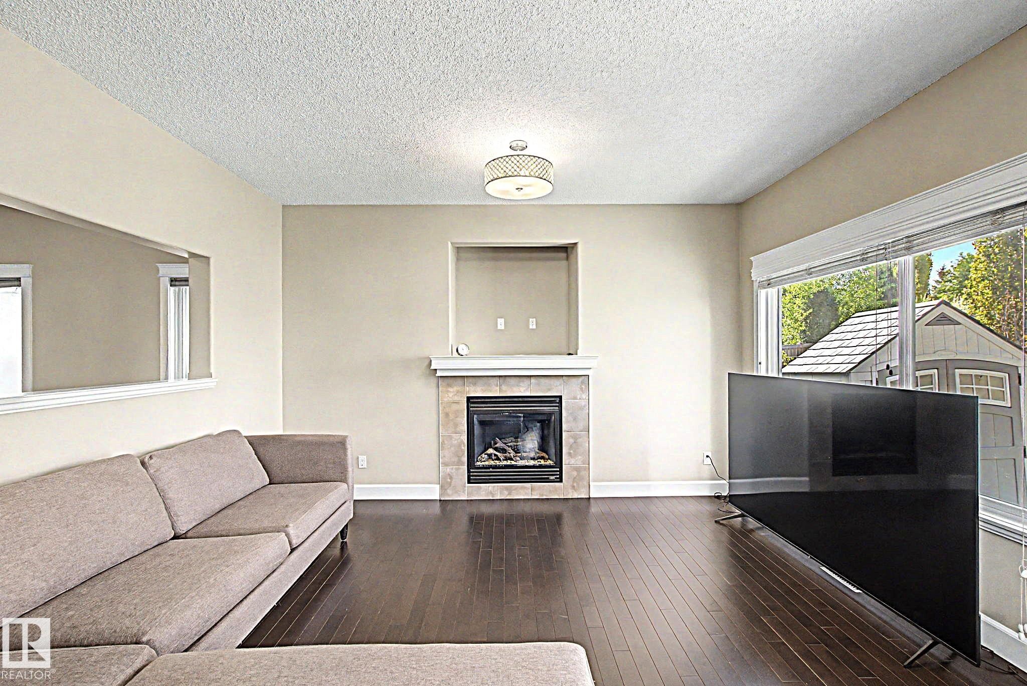 1932 67 Street, Edmonton, AB - Indoor Photo Showing Living Room With Fireplace