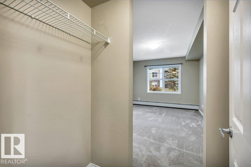 Closet featuring wire shelving system - 116 630 Mcallister Loop, Edmonton, AB